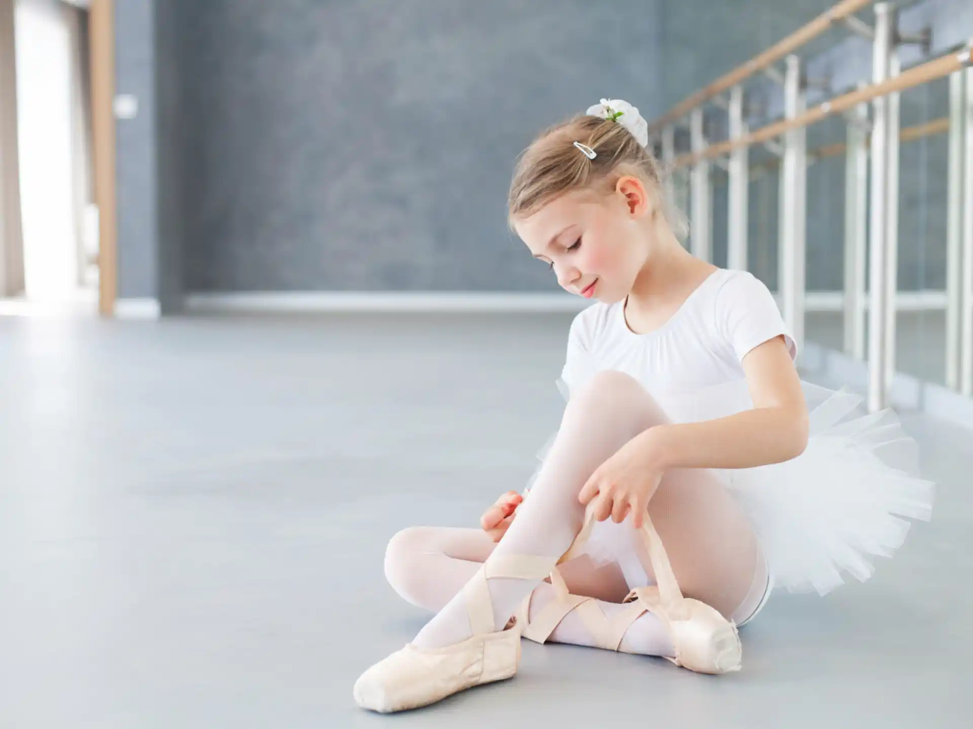 a girl sitting on the floor
