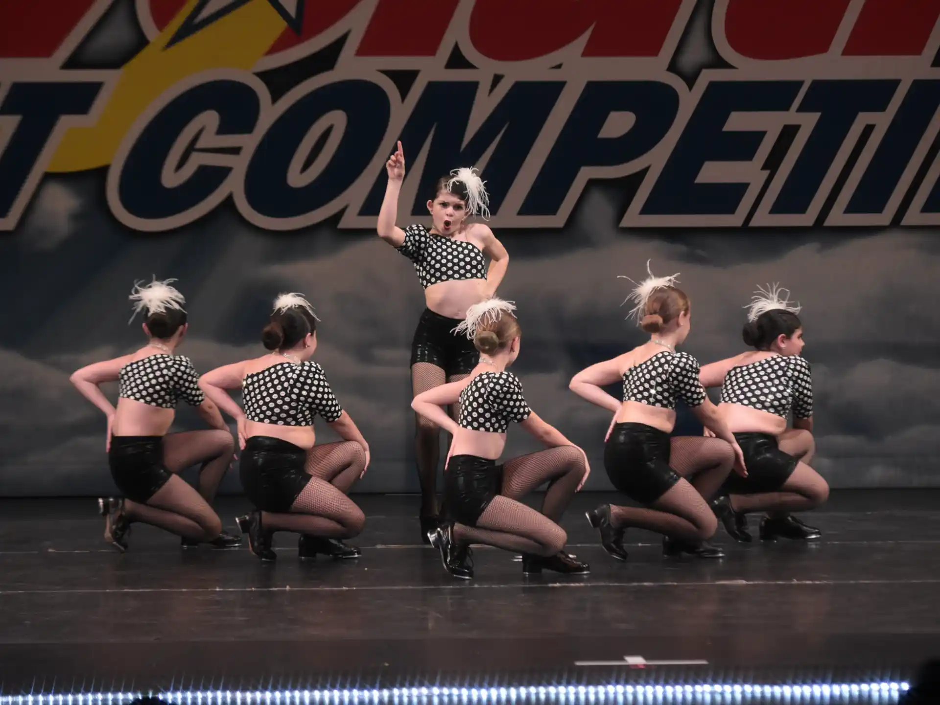 a group of women on a stage
