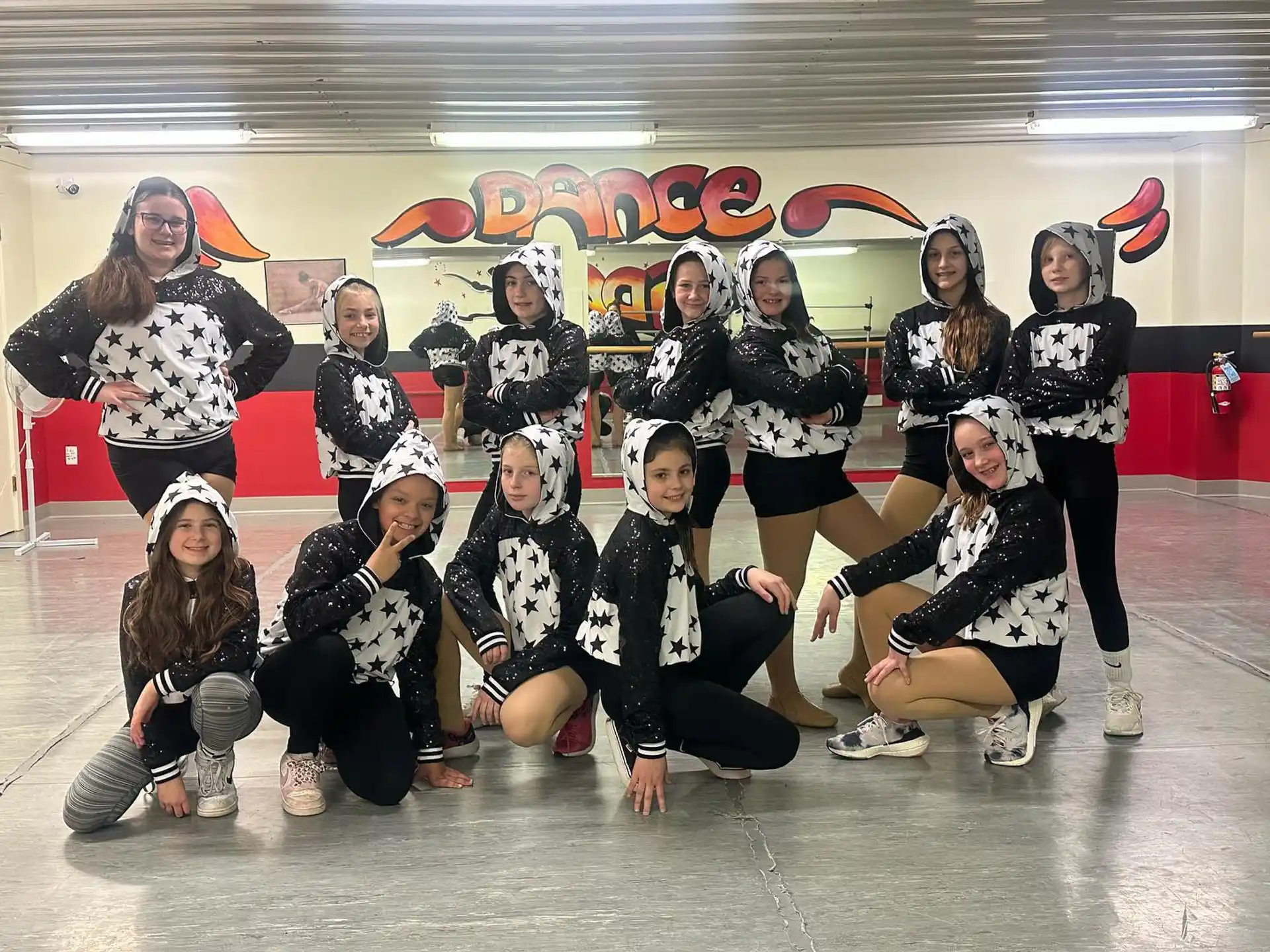 a group of women wearing clothing