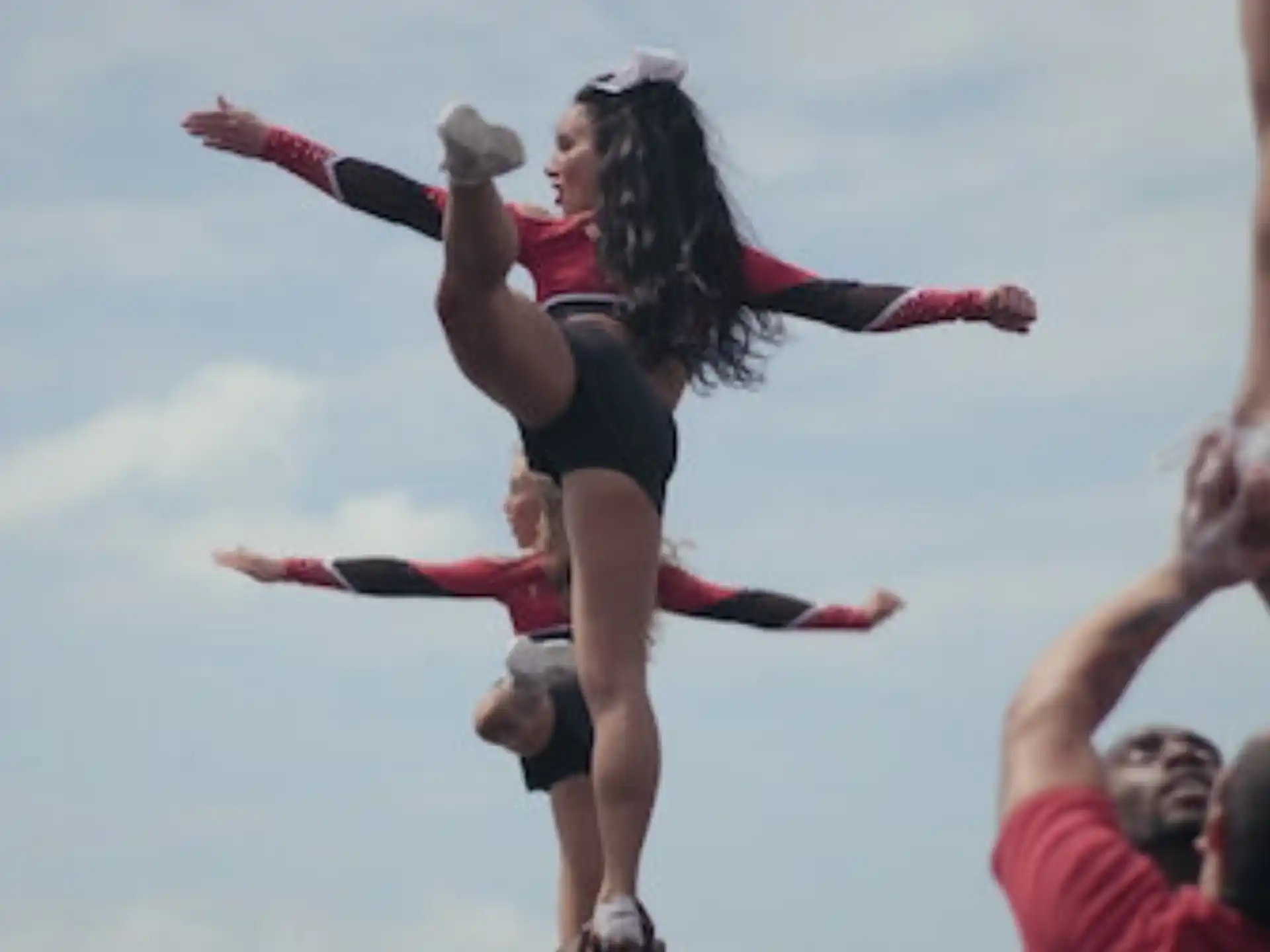 a woman doing a handstand