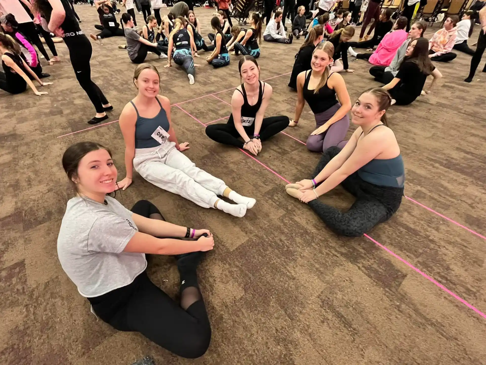 a group of women doing yoga