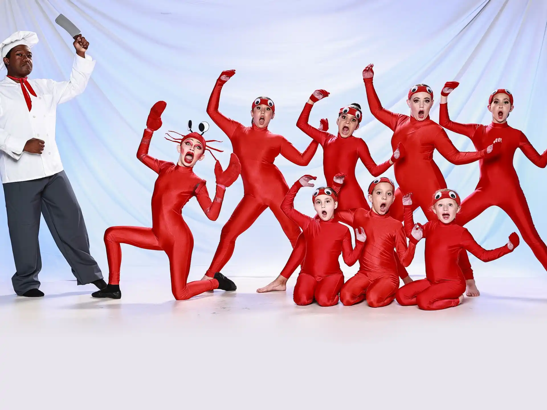 a group of people in red clothing