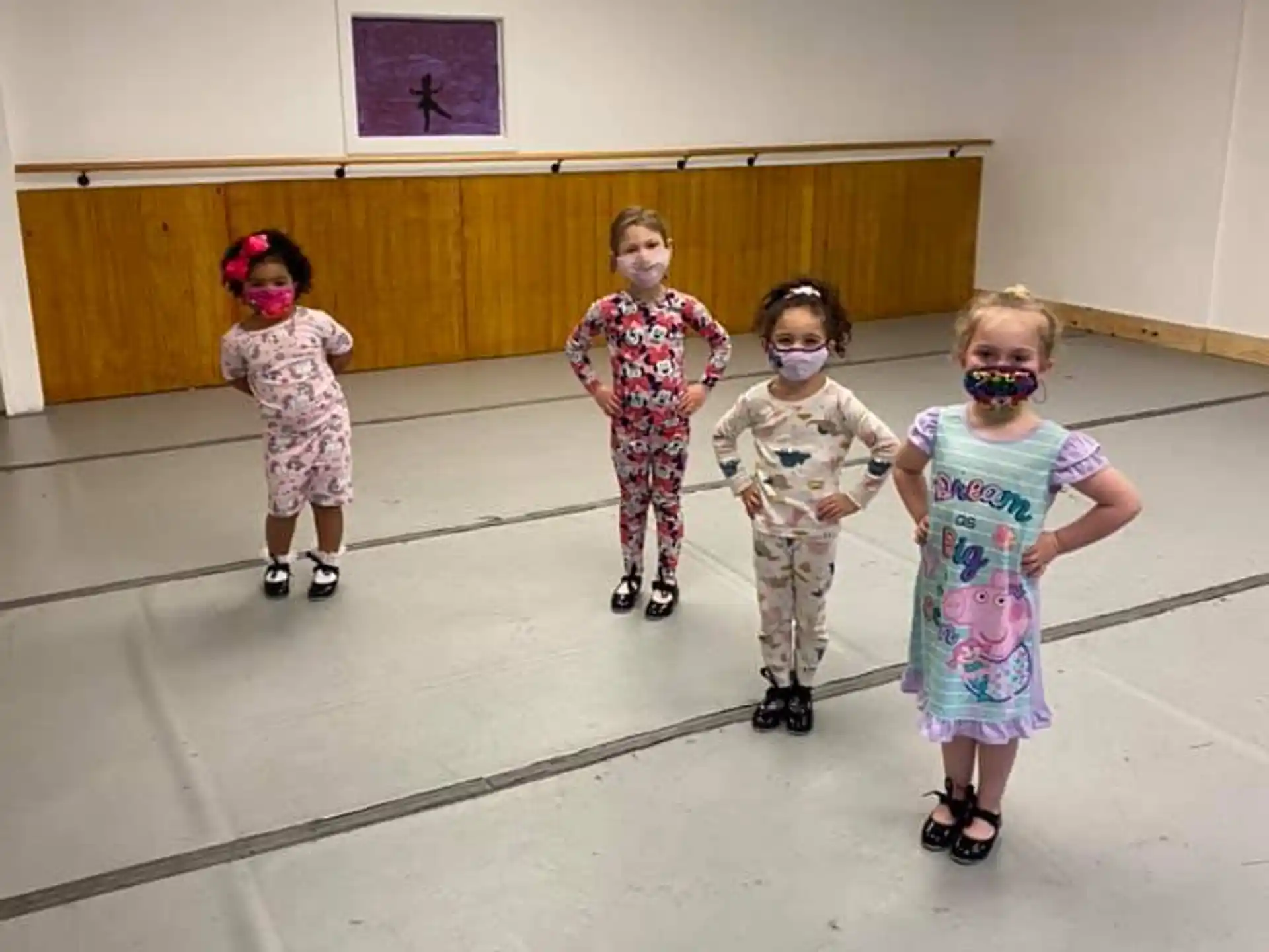 a group of children wearing clothing