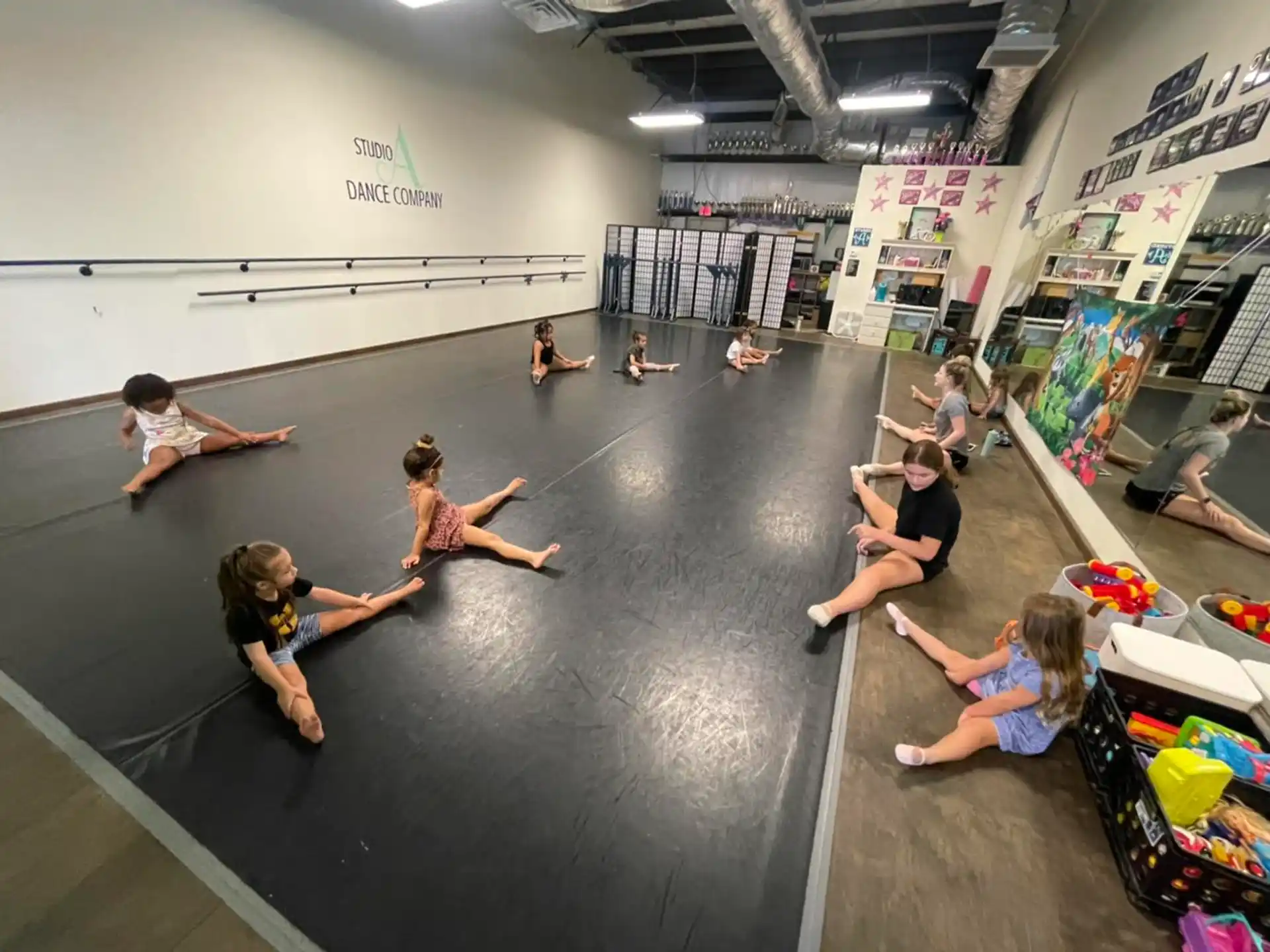 a group of people exercising in a gym