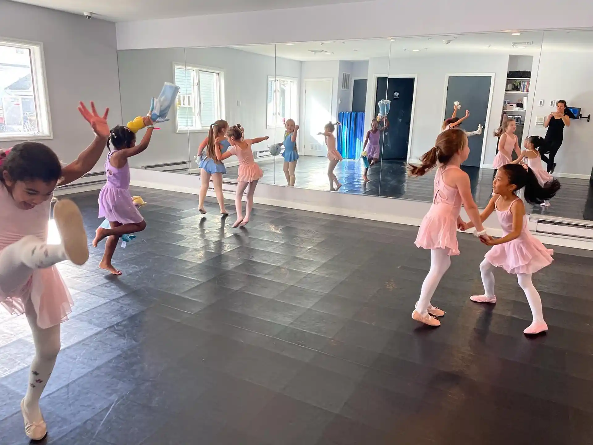 a group of children dancing