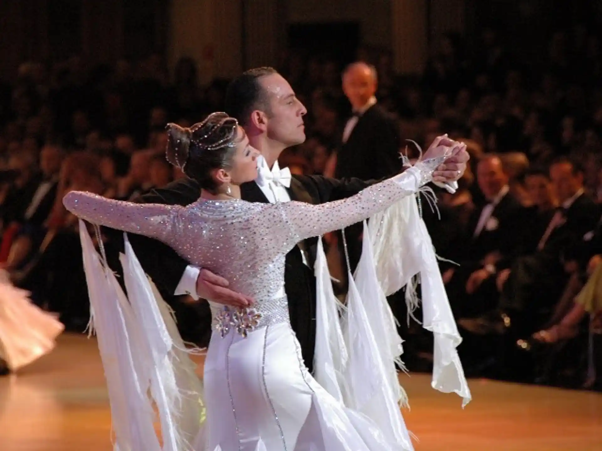 a man and woman dancing