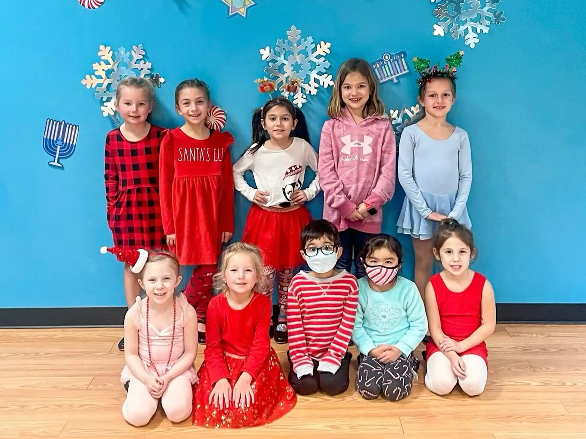 a group of children posing for a photo