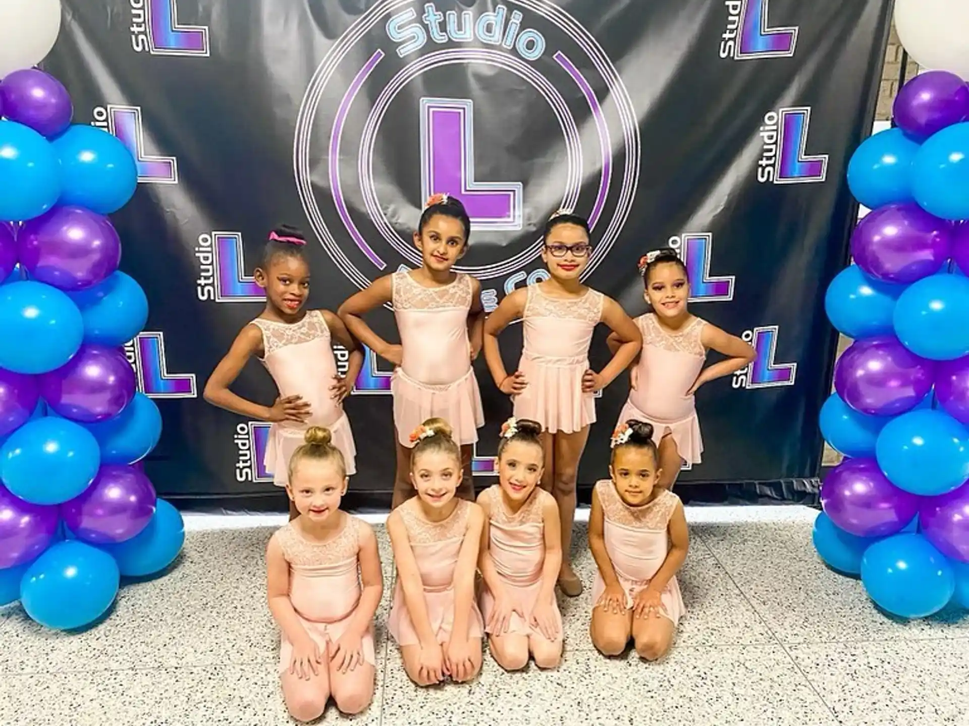 a group of people posing for the camera