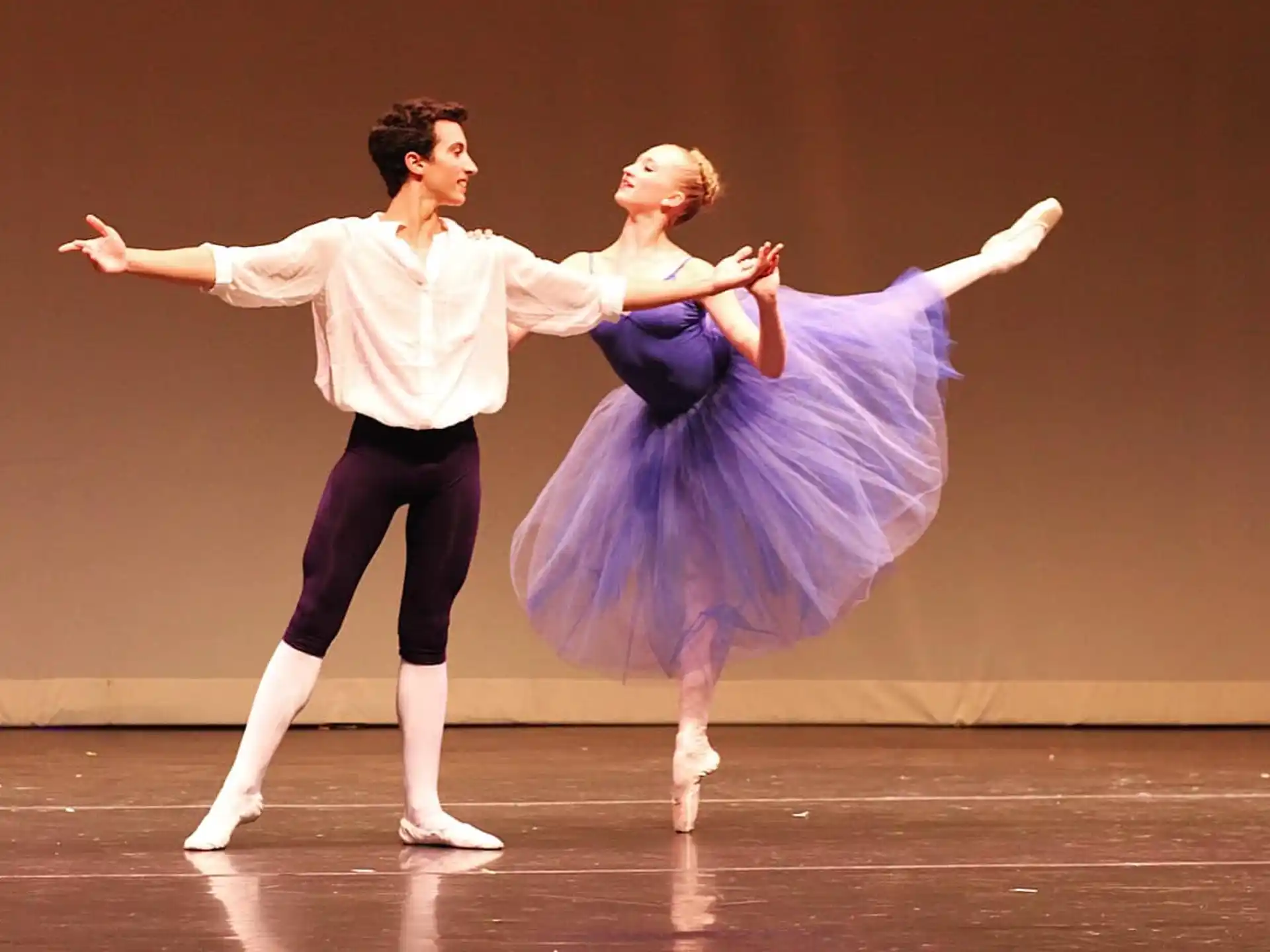 a man and woman dancing