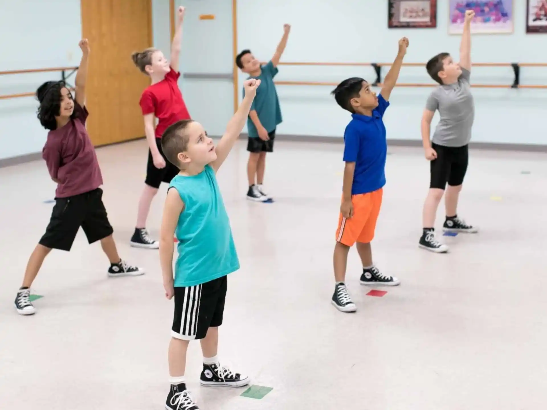 a group of kids in a gym