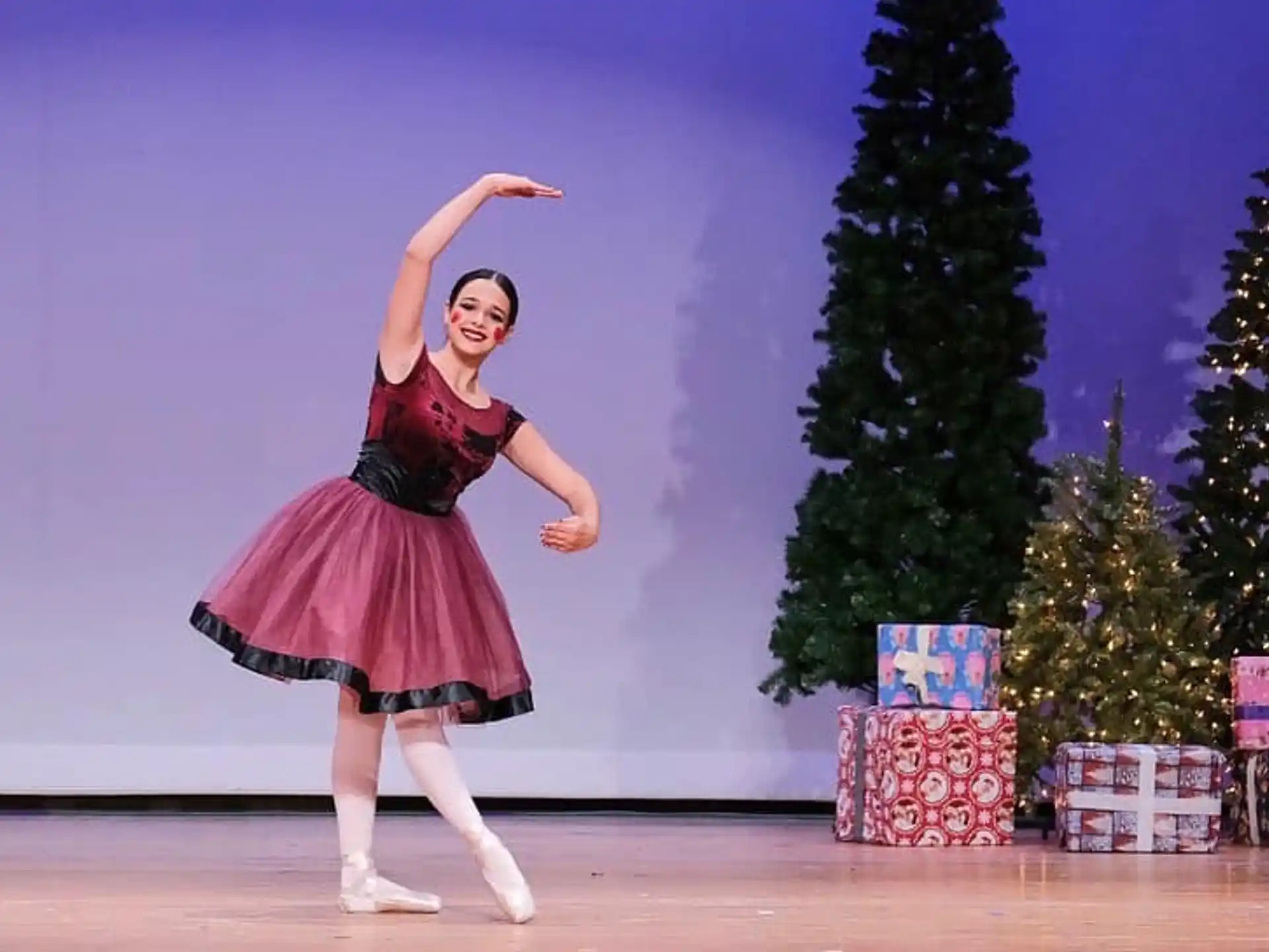 a woman dancing on a stage