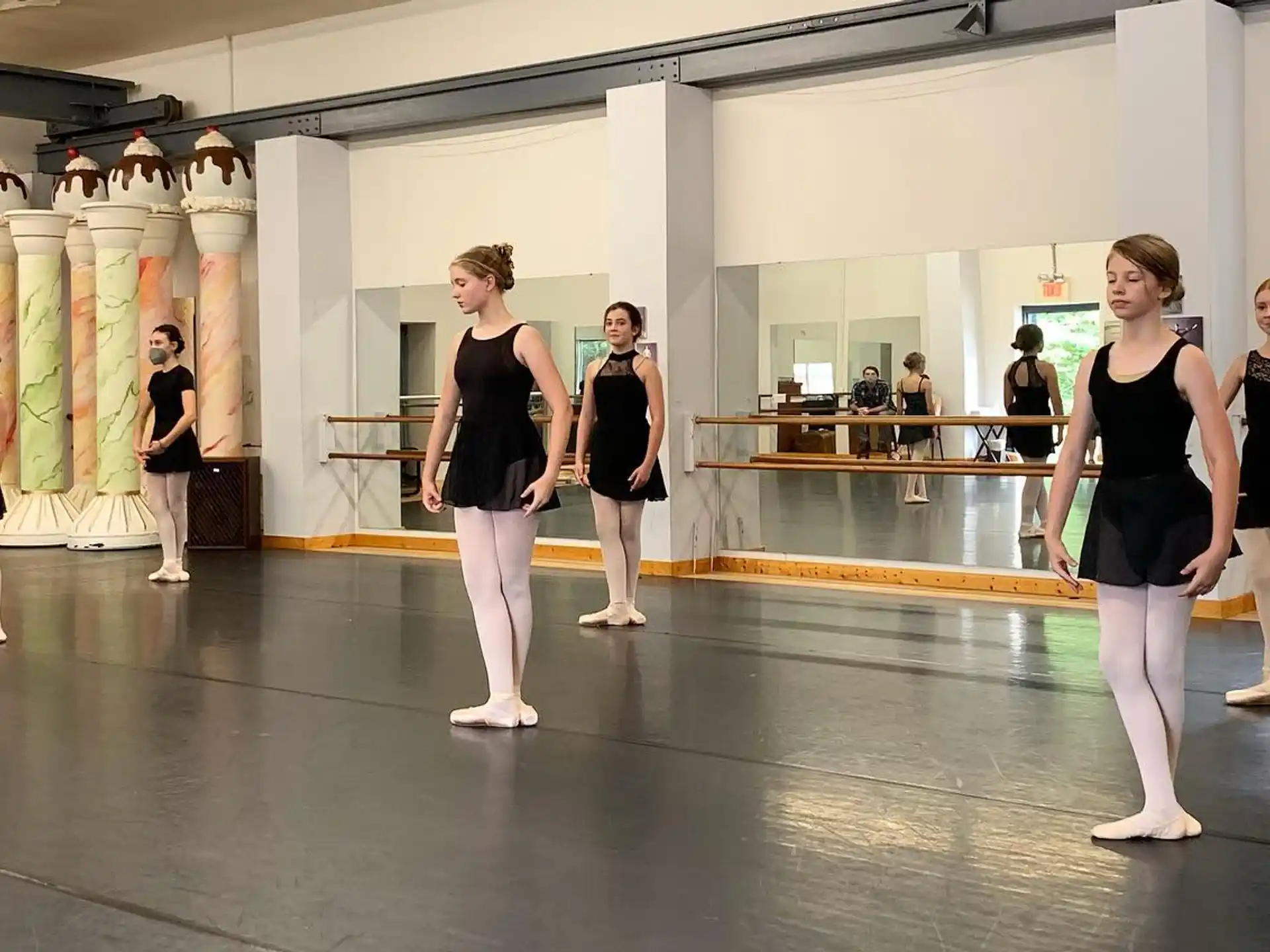 a group of women dancing in a room