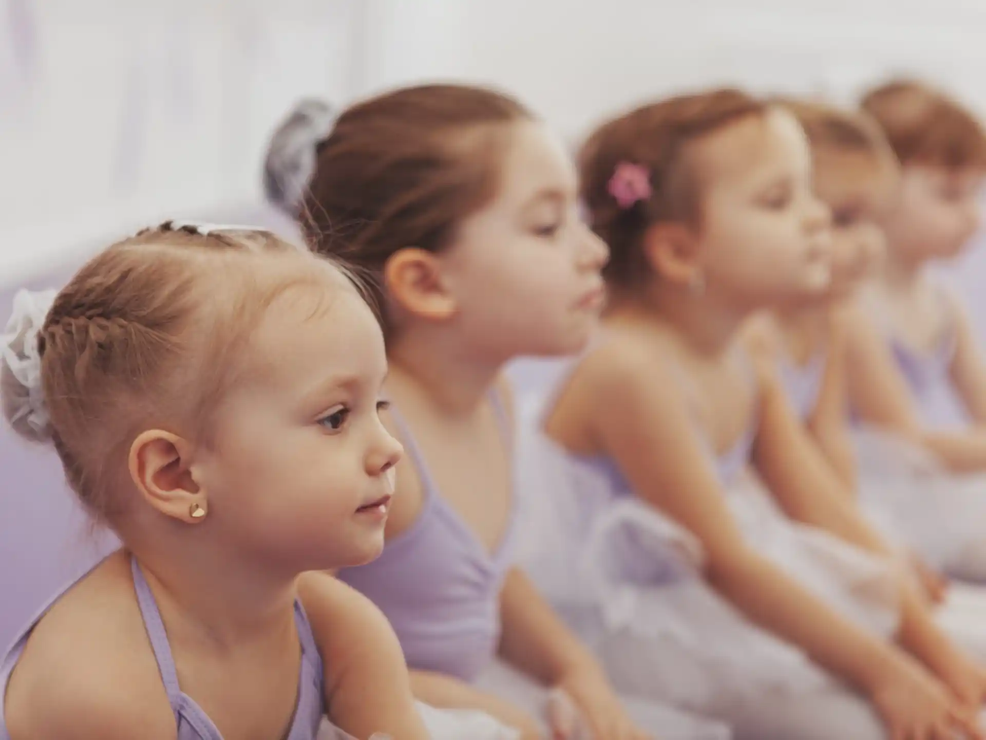 a group of young girls in a classroom