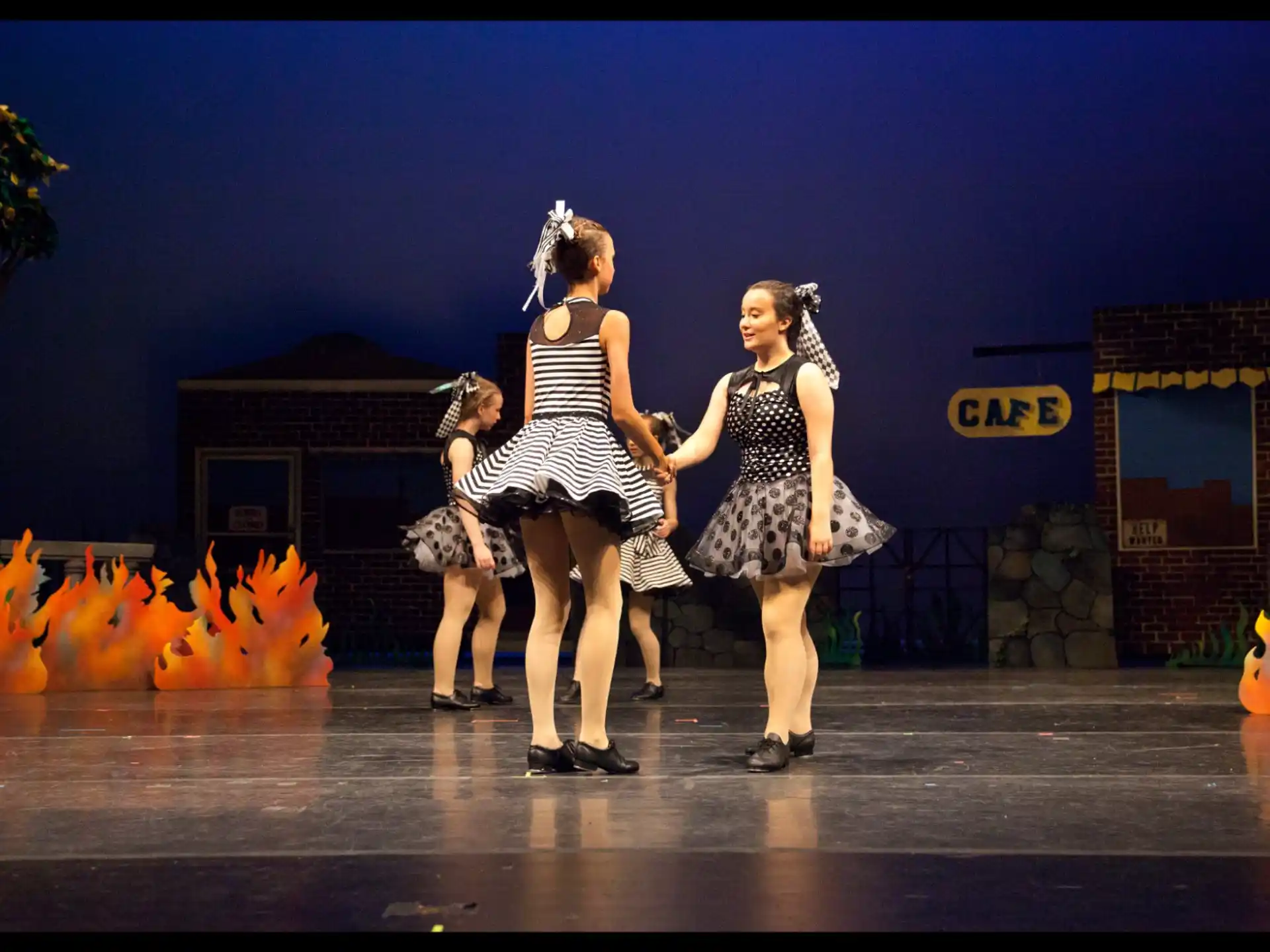 a group of women on a stage