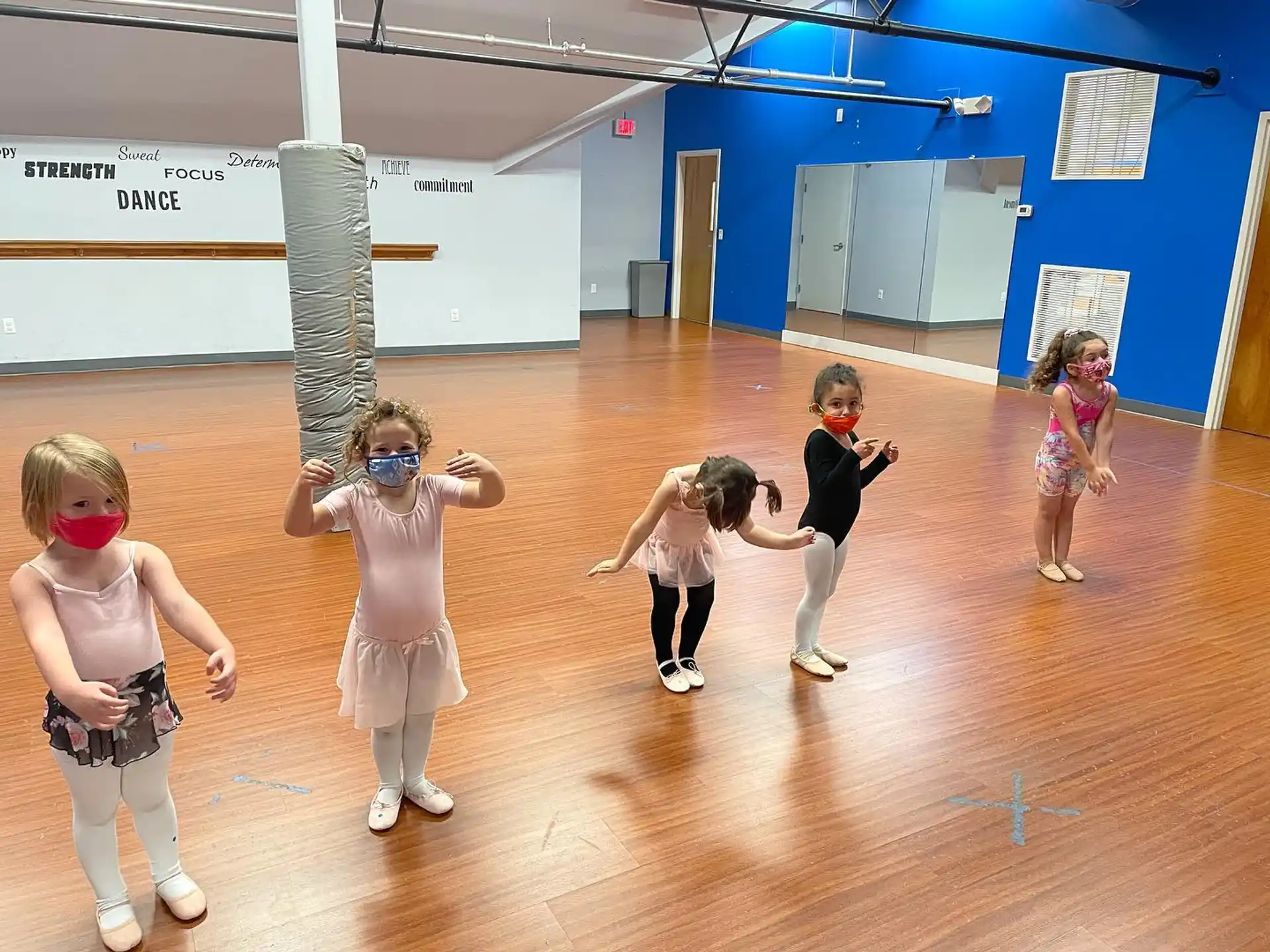 a group of children dancing