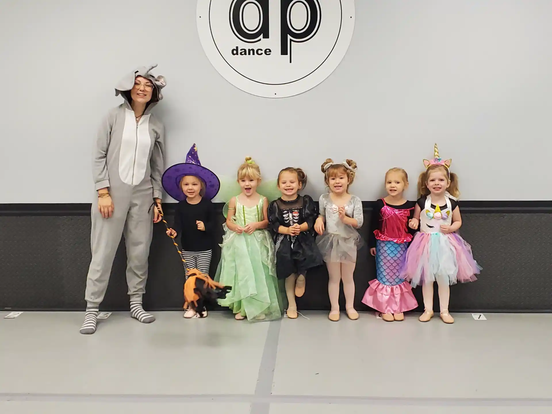 a group of children in clothing