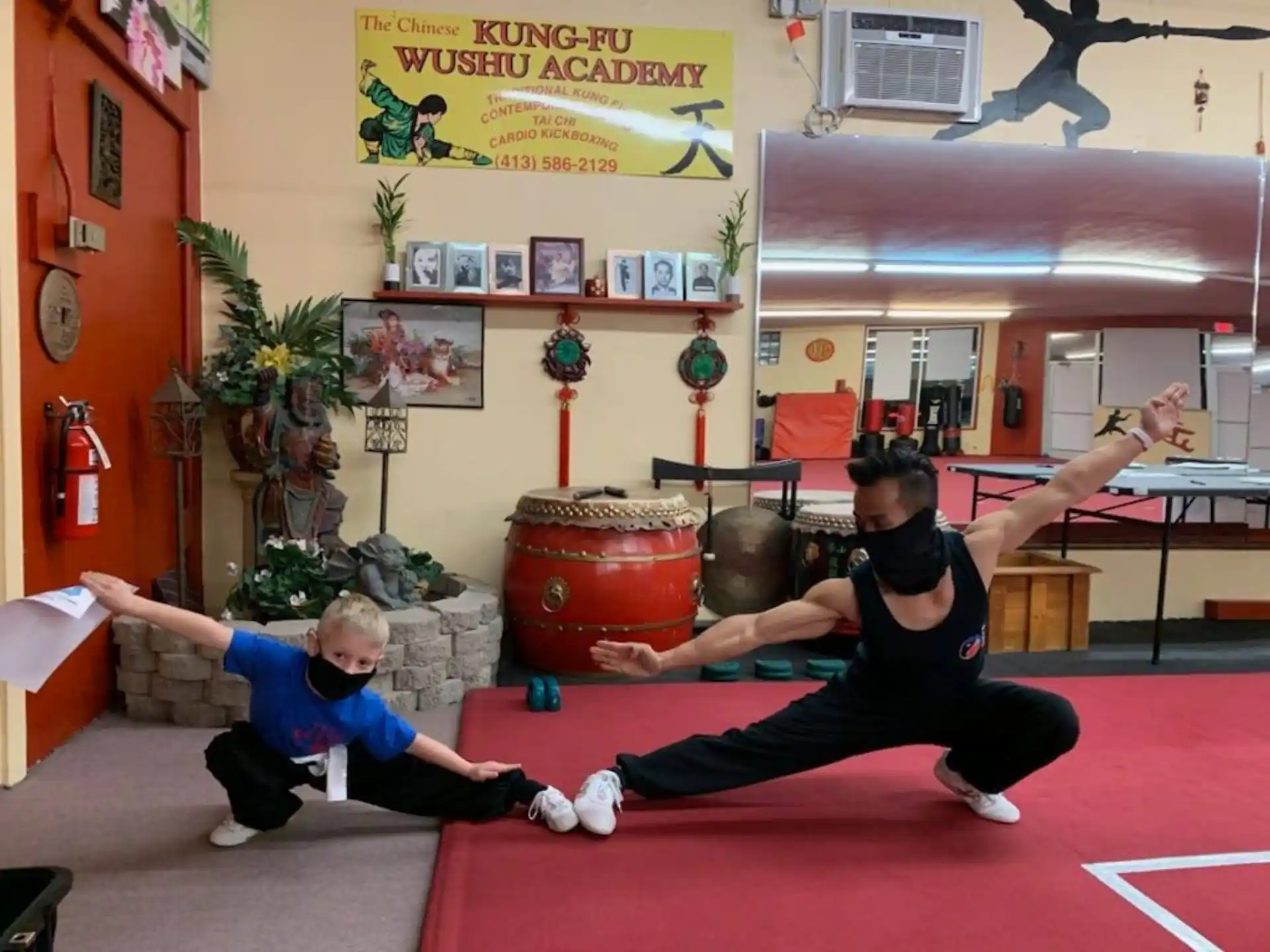 a person and a child exercising