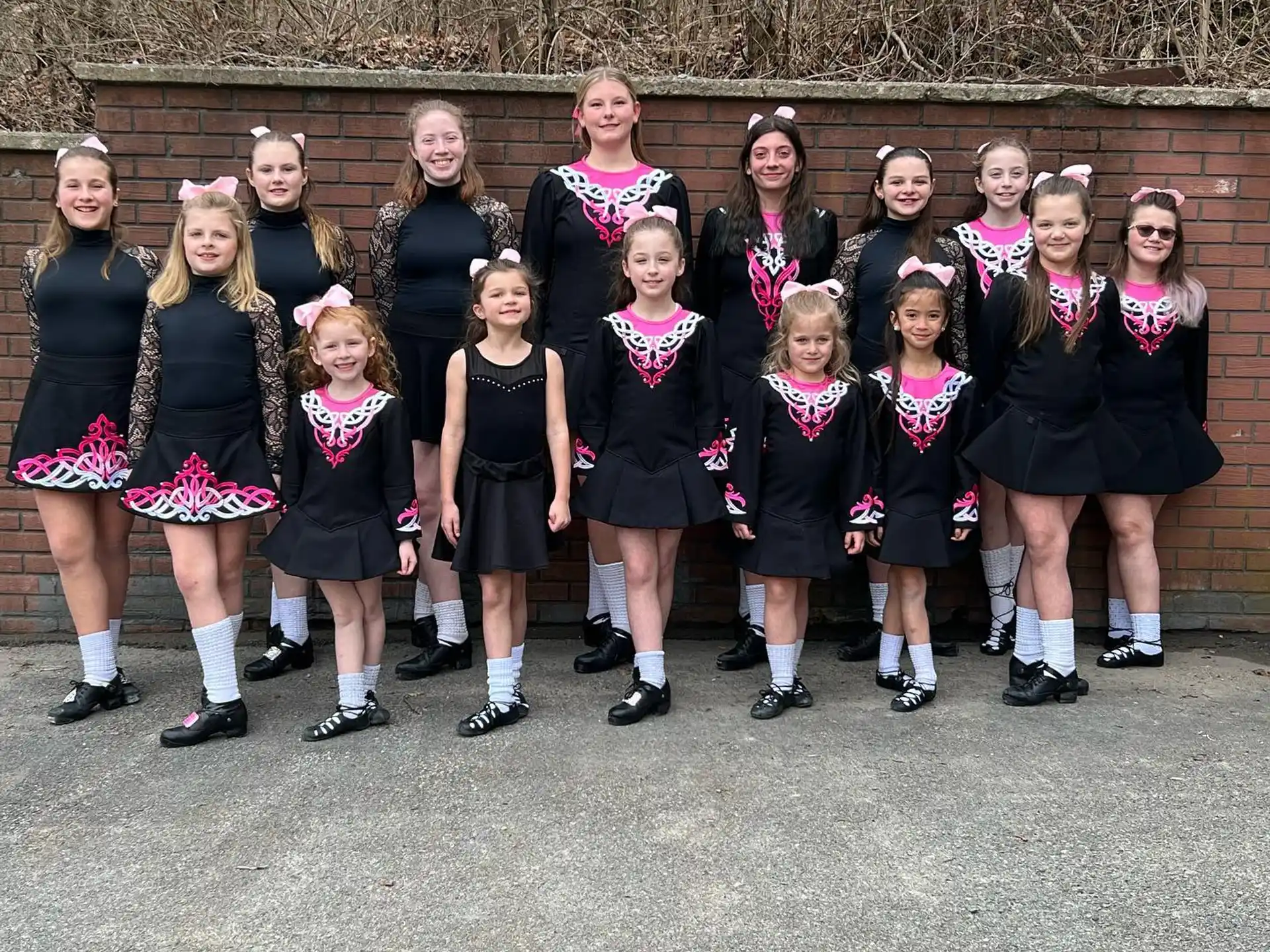 a group of girls in school uniforms
