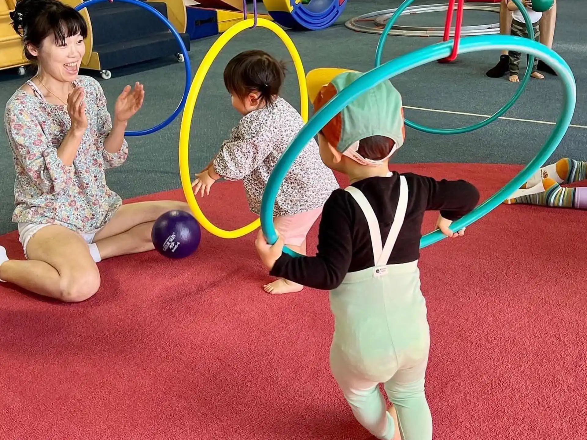 a group of children playing on a playground