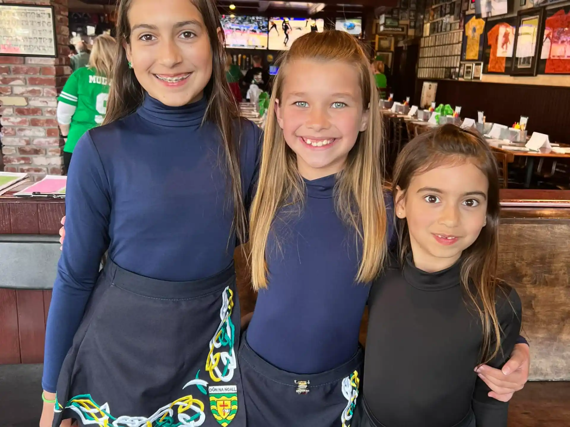 a group of girls posing for a picture