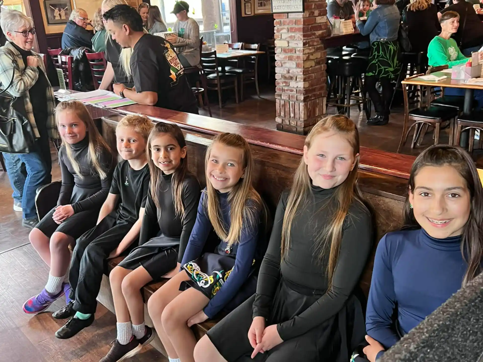 a group of people sitting in chairs