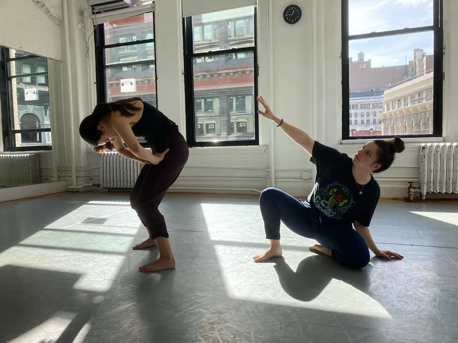 a couple of women doing yoga