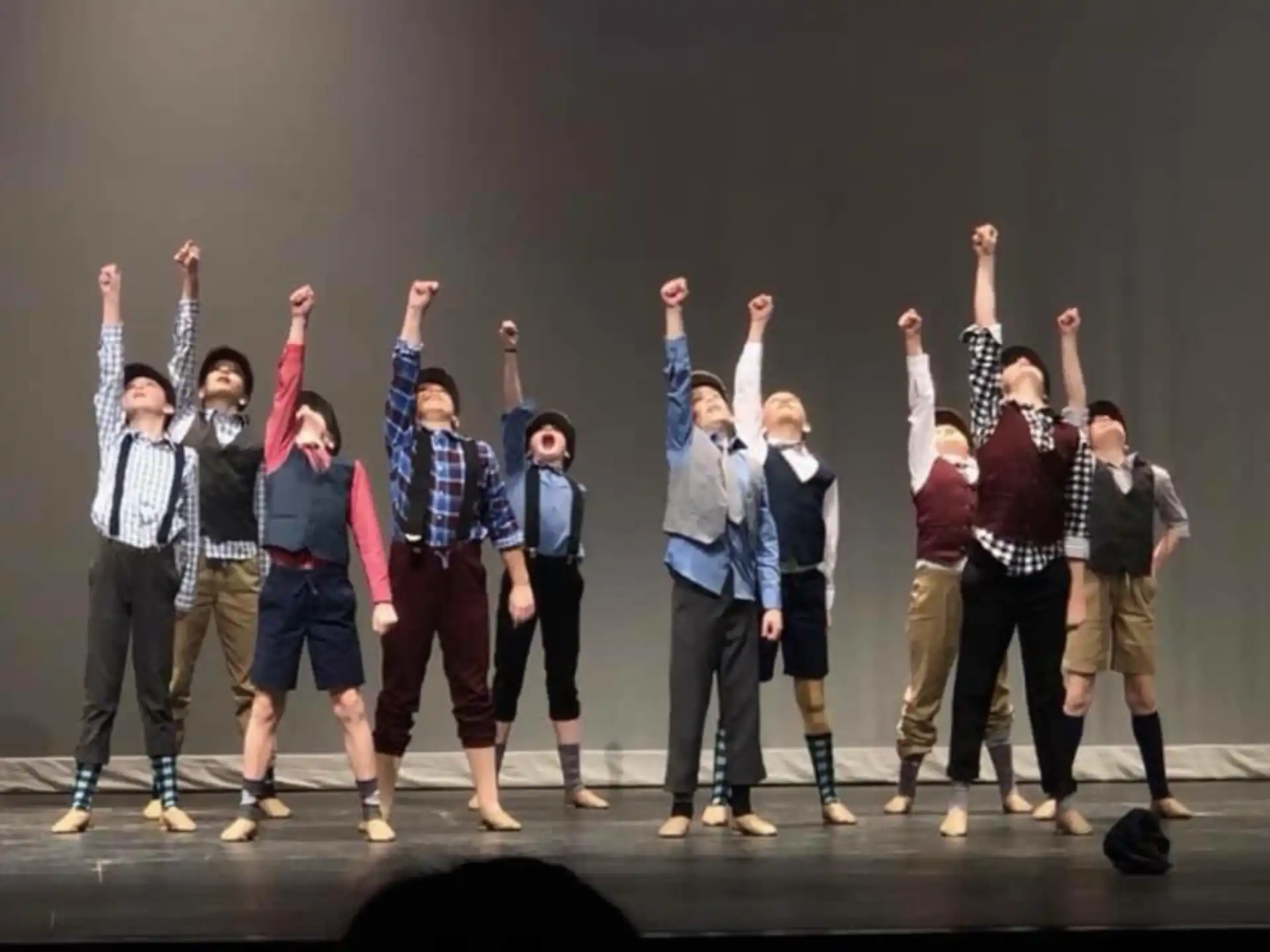 a group of people on a stage