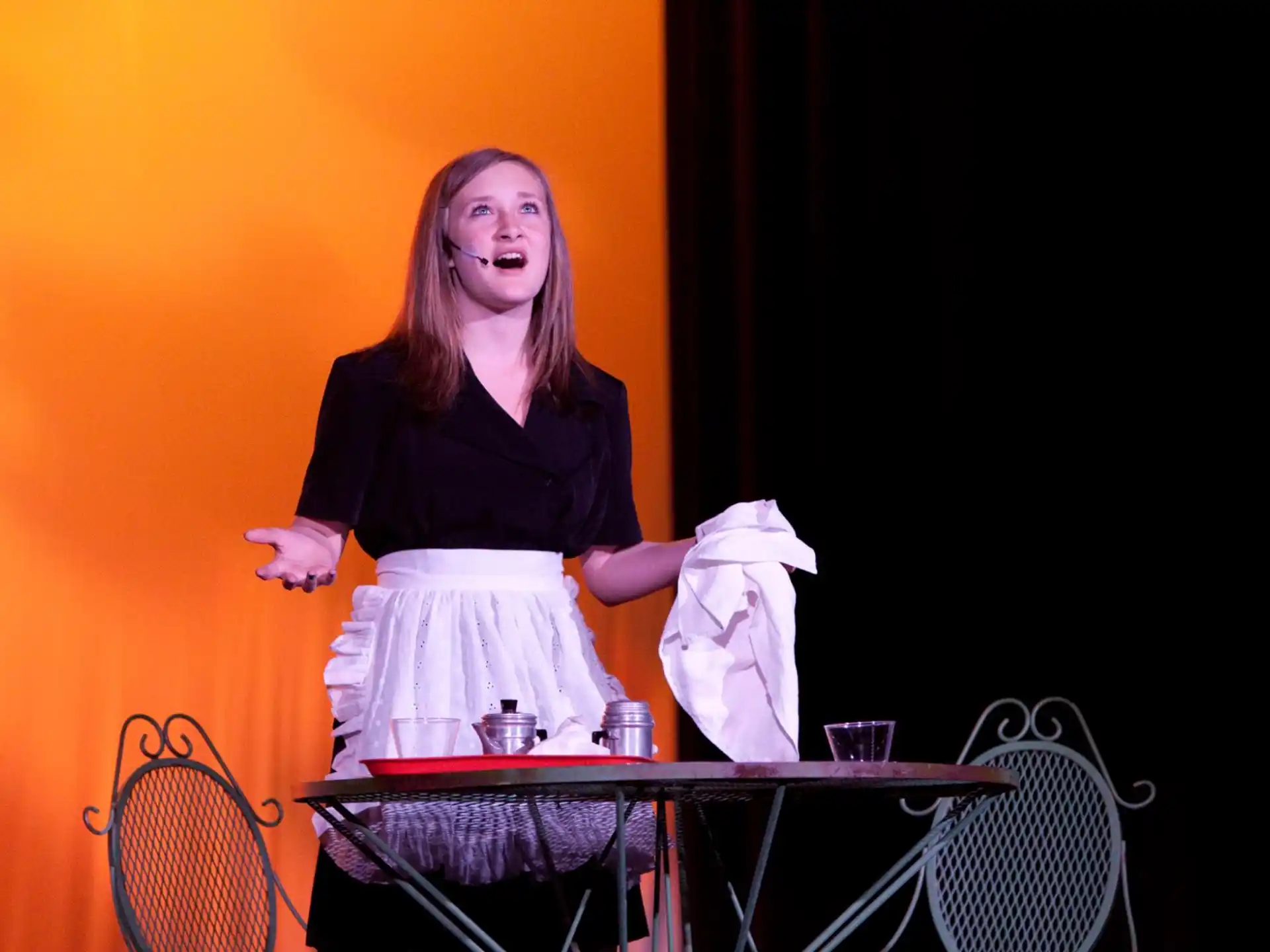 a person standing at a table