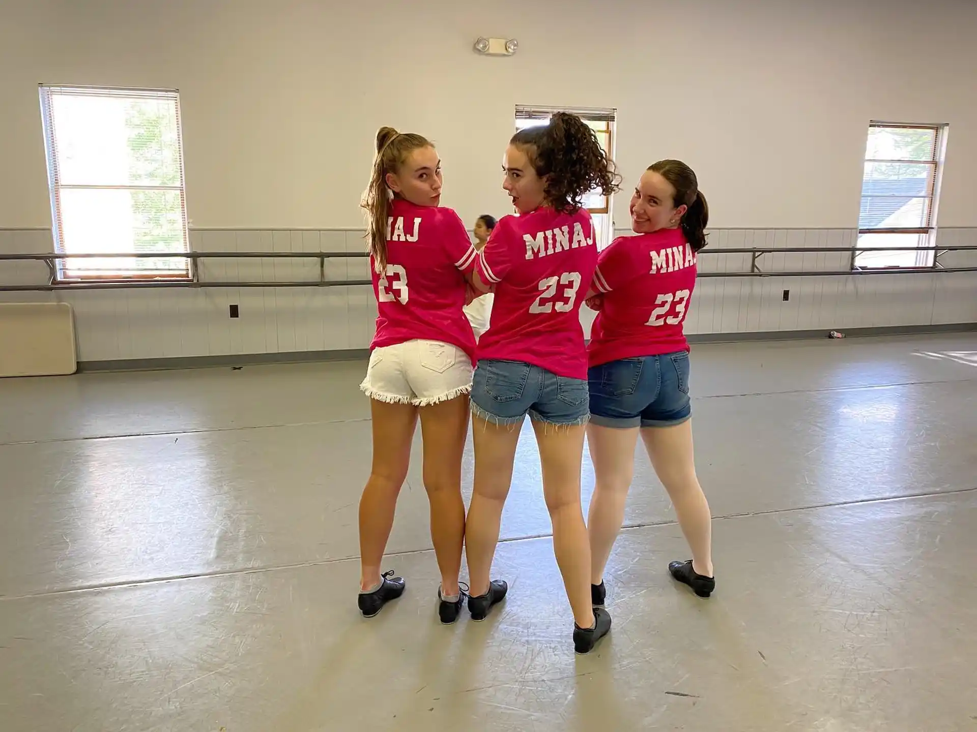 a group of girls in a gym