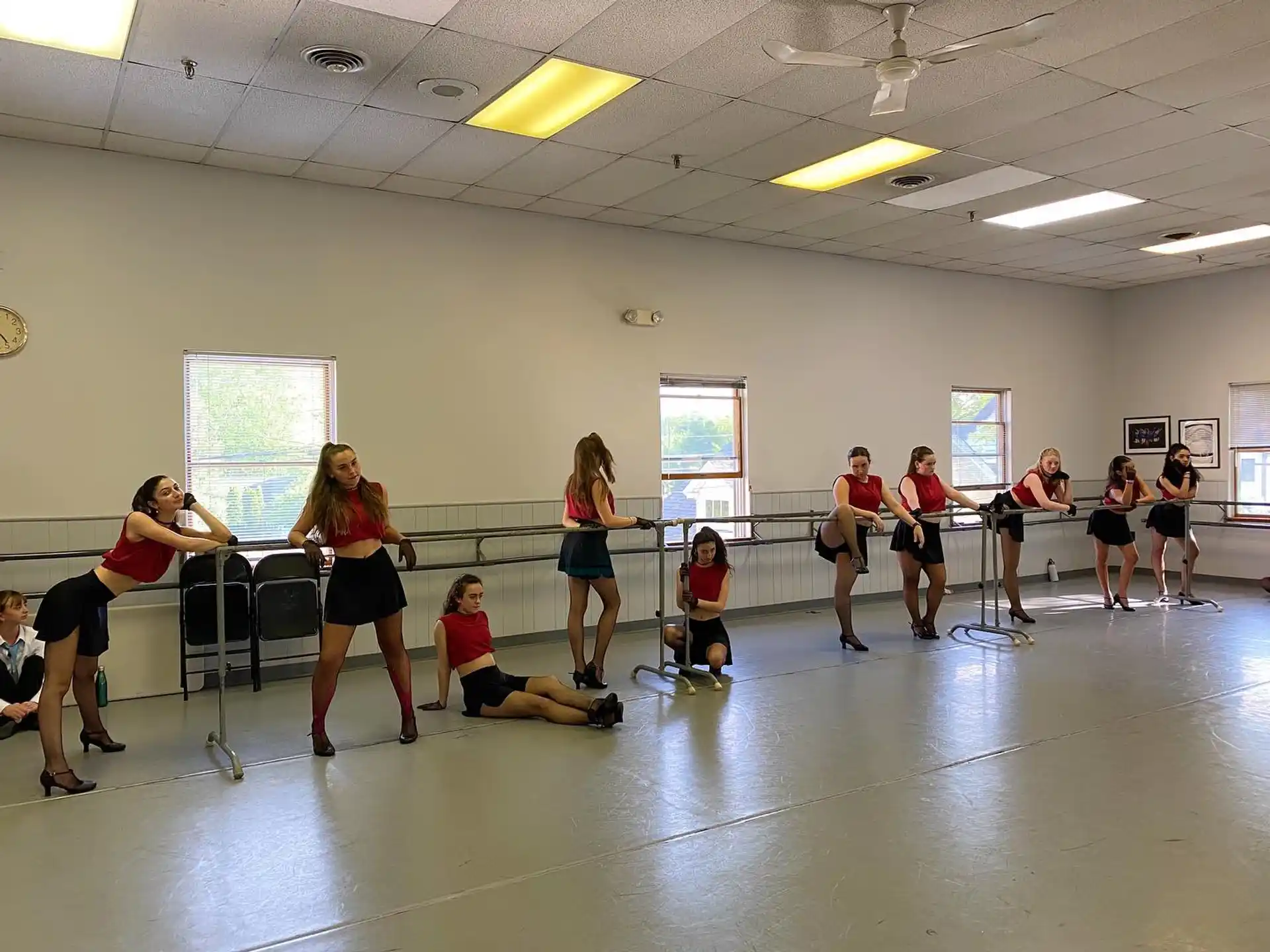 a group of people exercising in a room