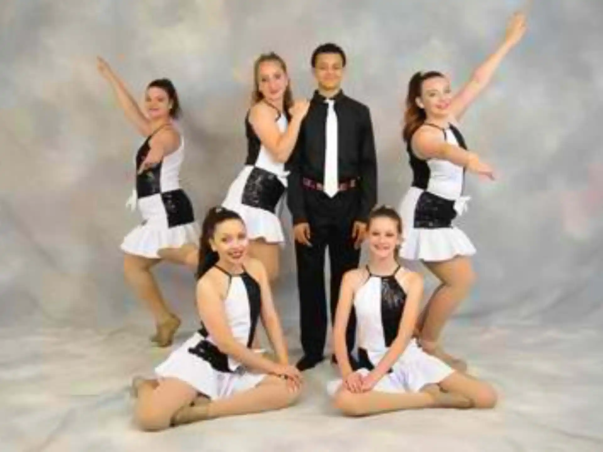 a group of people posing for a photo
