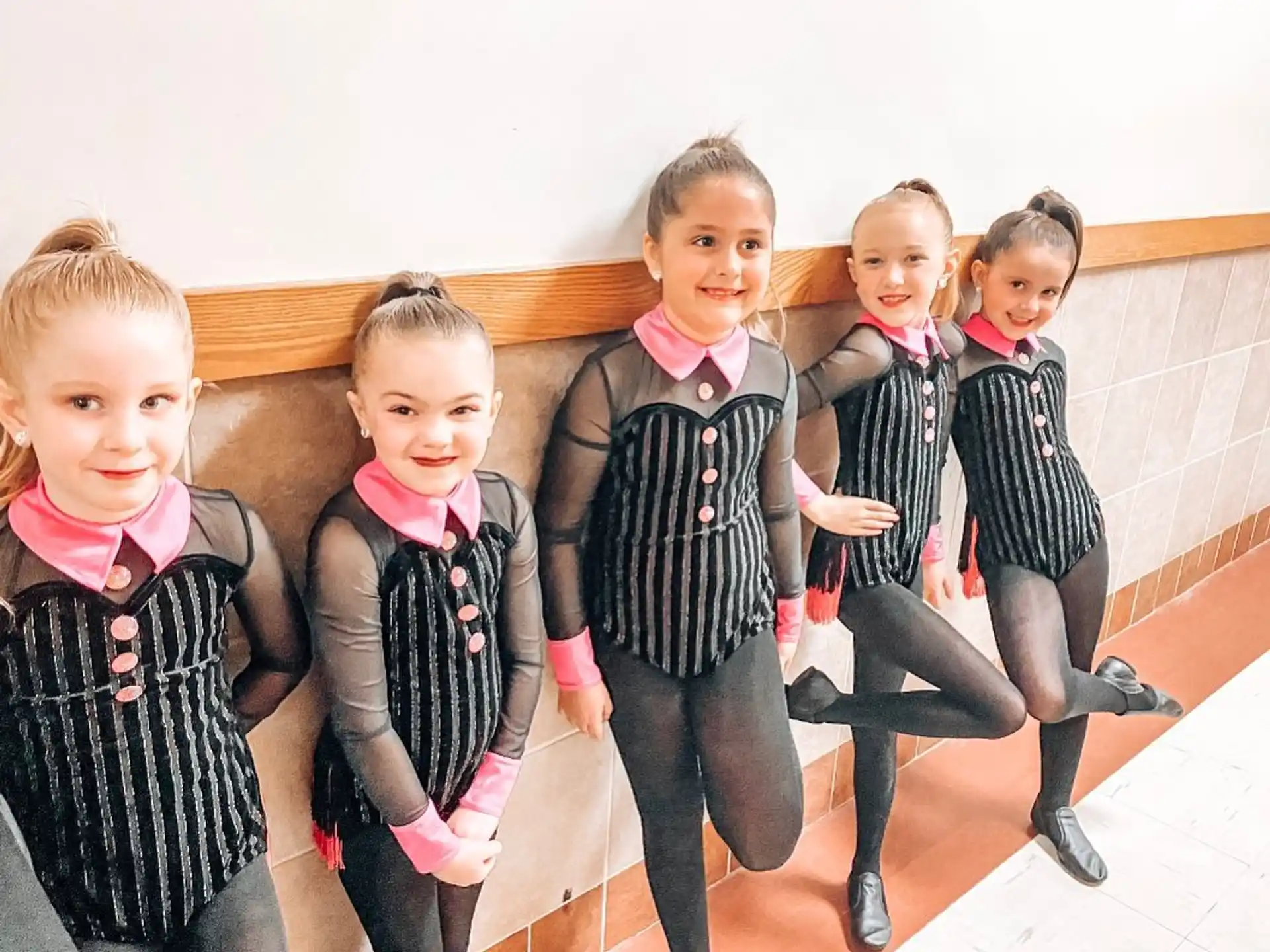 a group of children posing for a photo