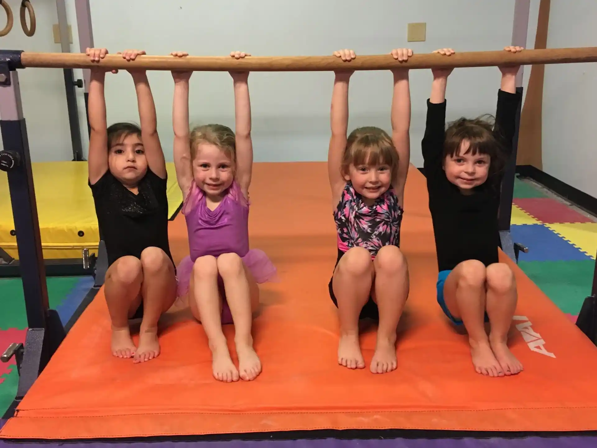 a group of children on a mat
