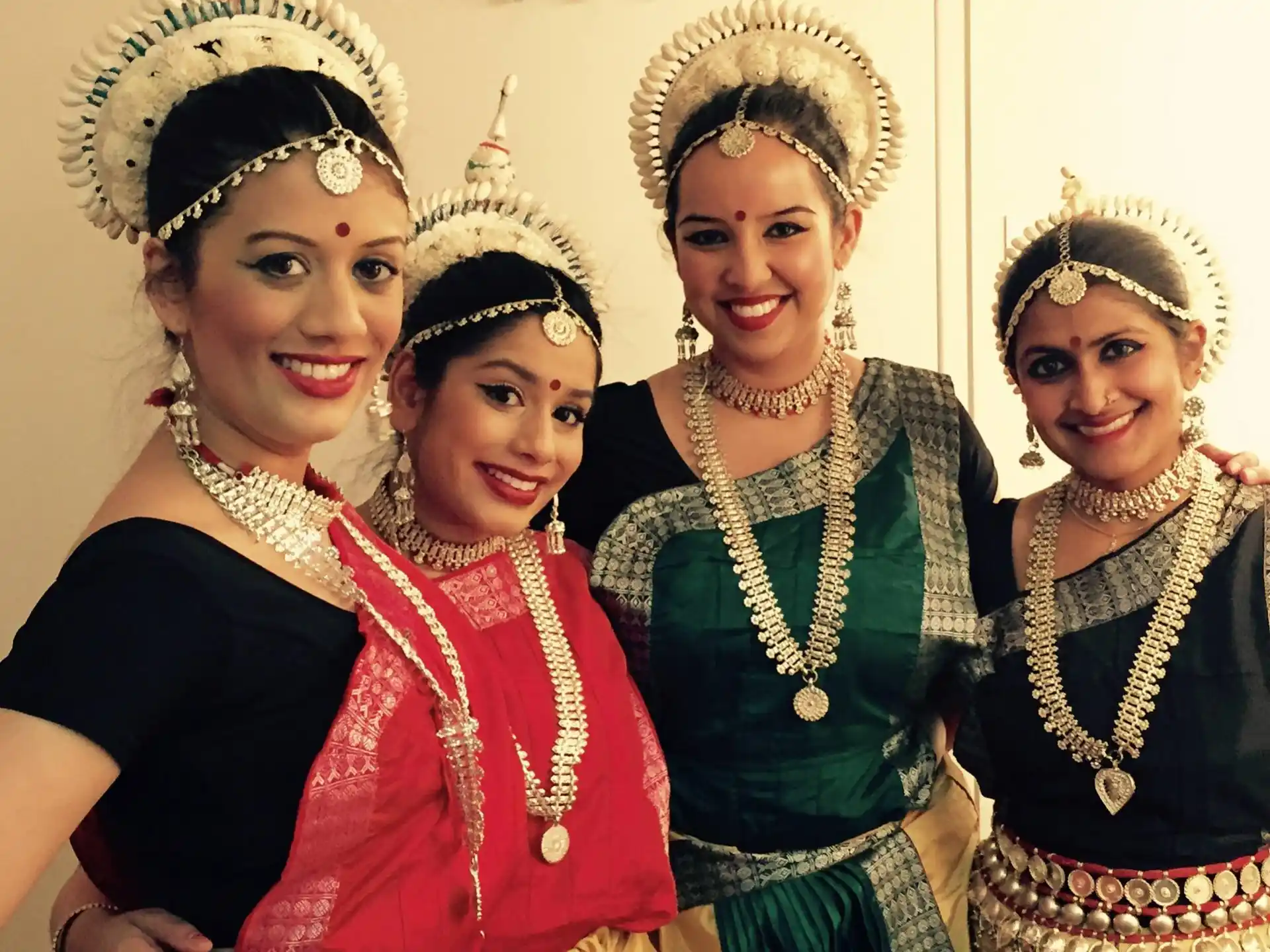 a group of women wearing traditional clothing