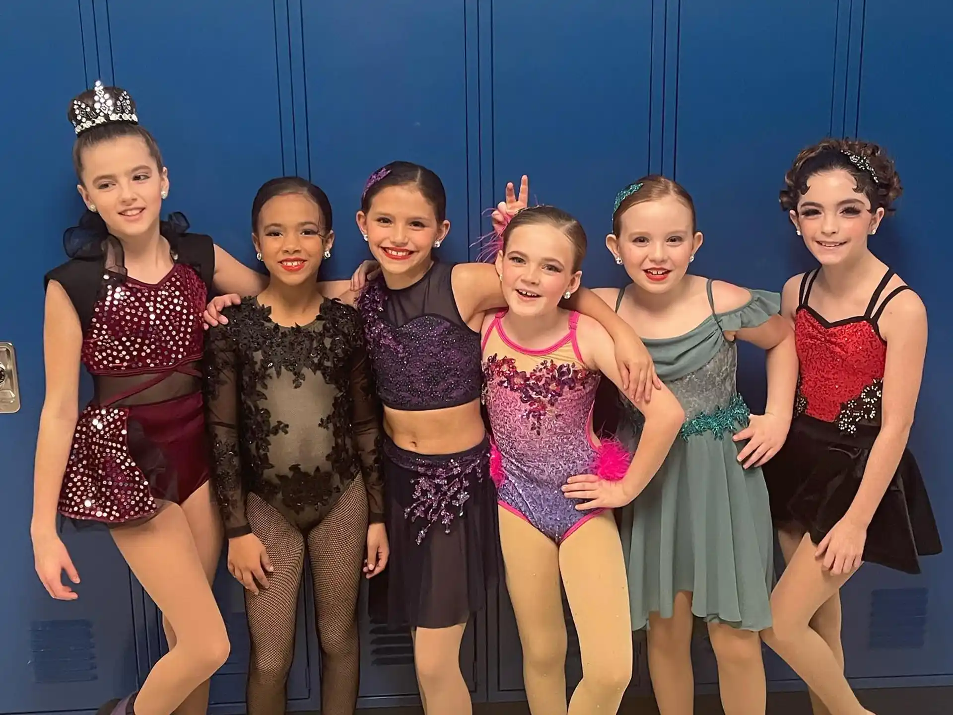 a group of girls in clothing