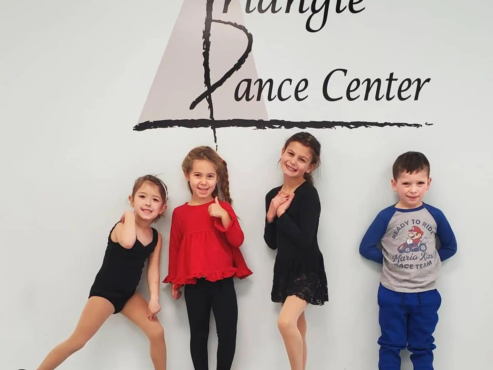 a group of people posing for the camera