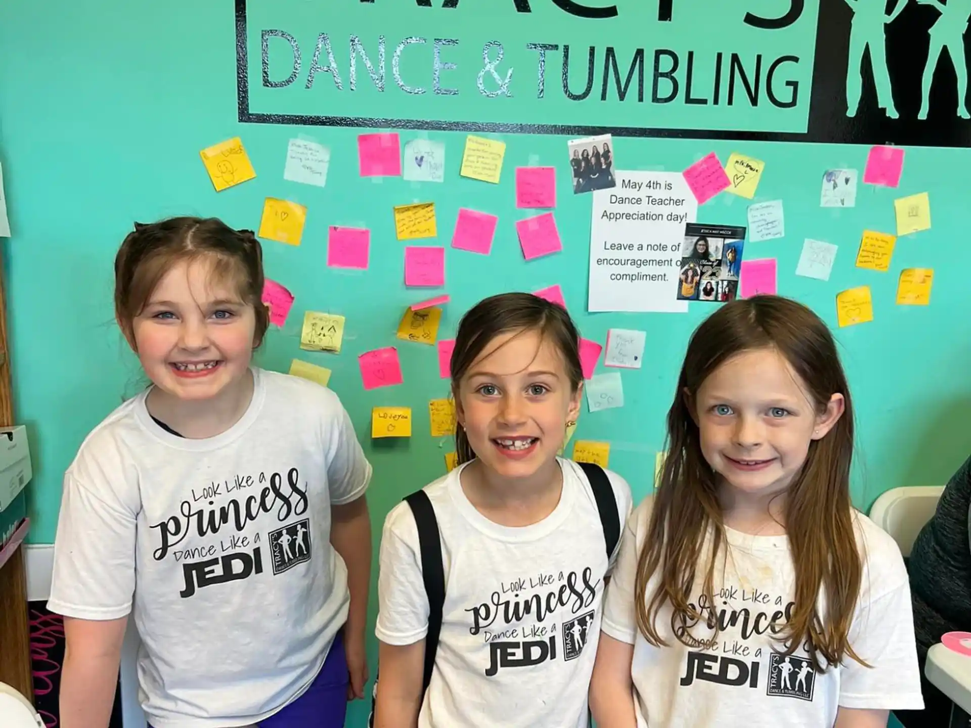 a group of girls posing for a picture