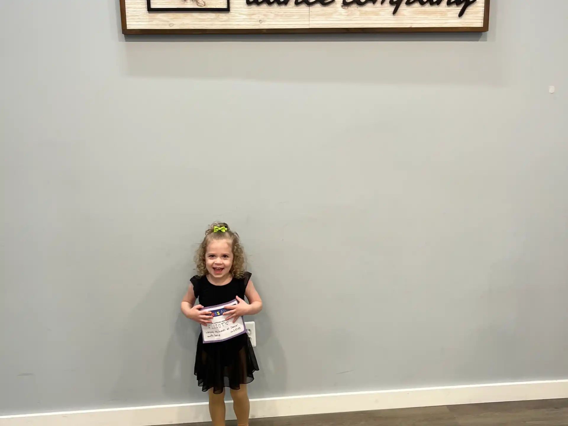 a girl holding a book