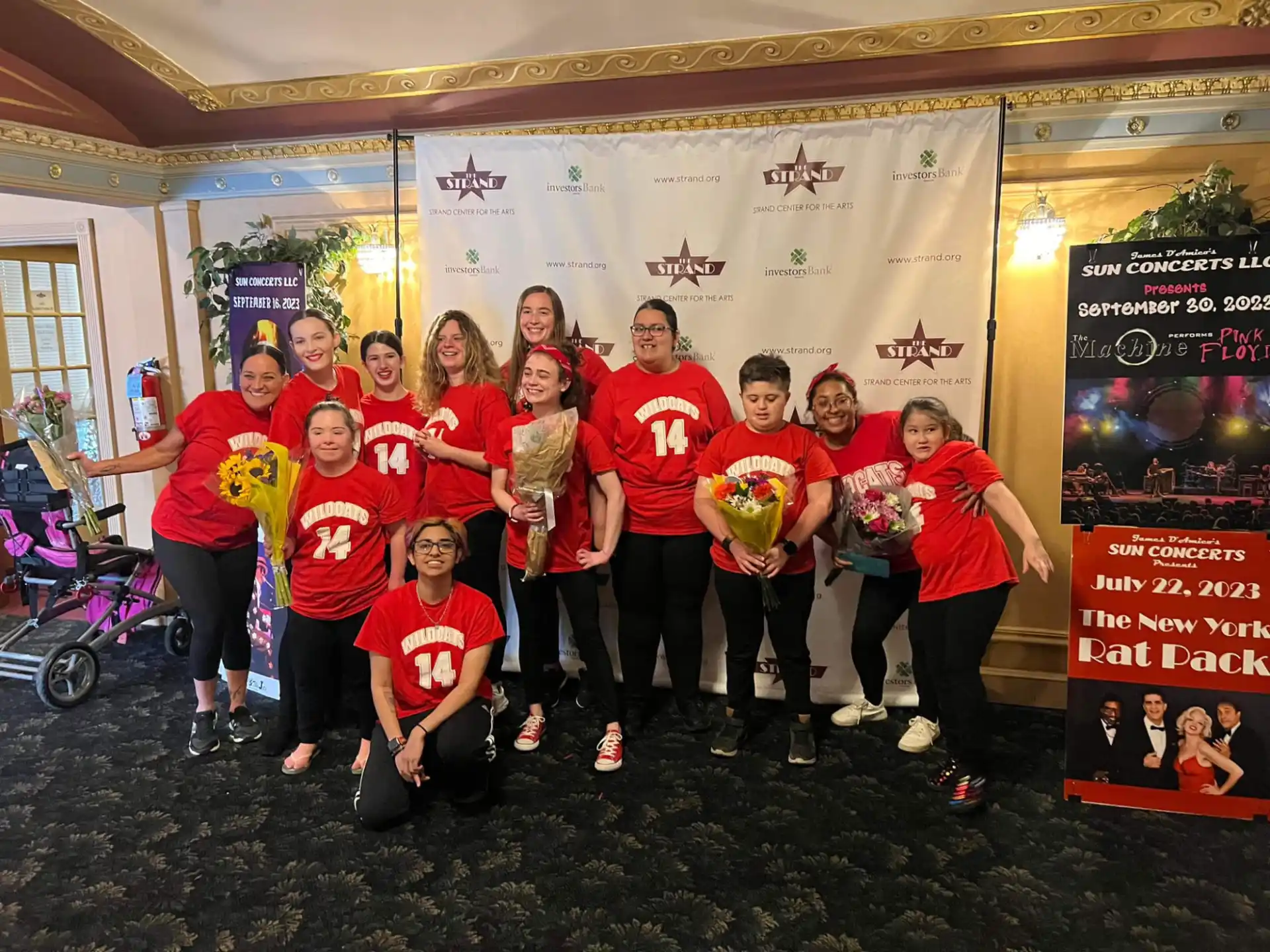 a group of people posing for a photo