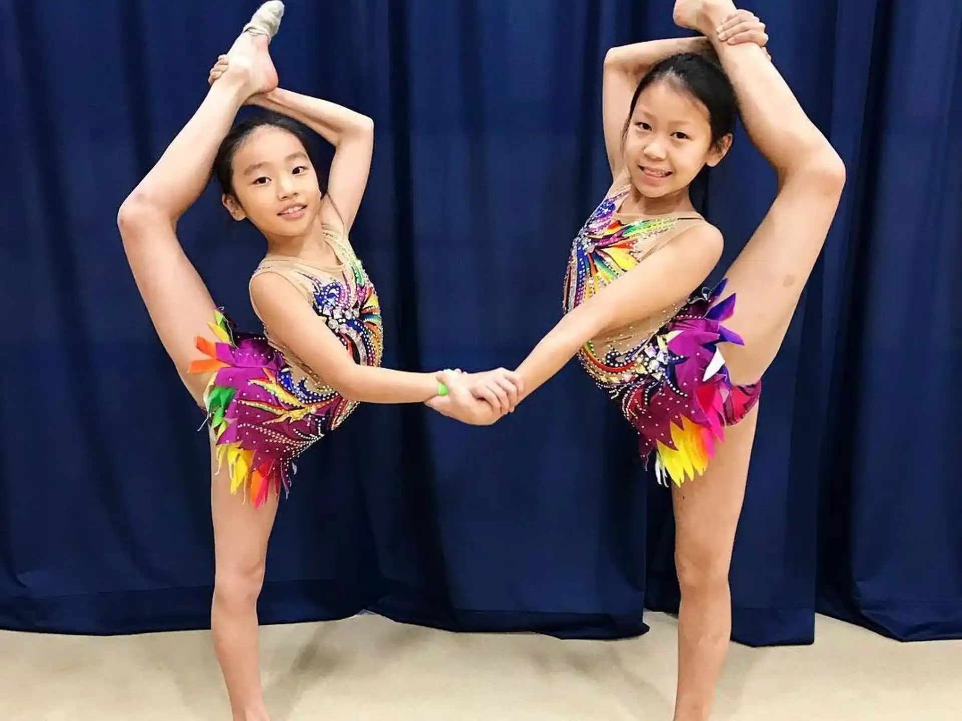 two girls wearing clothing