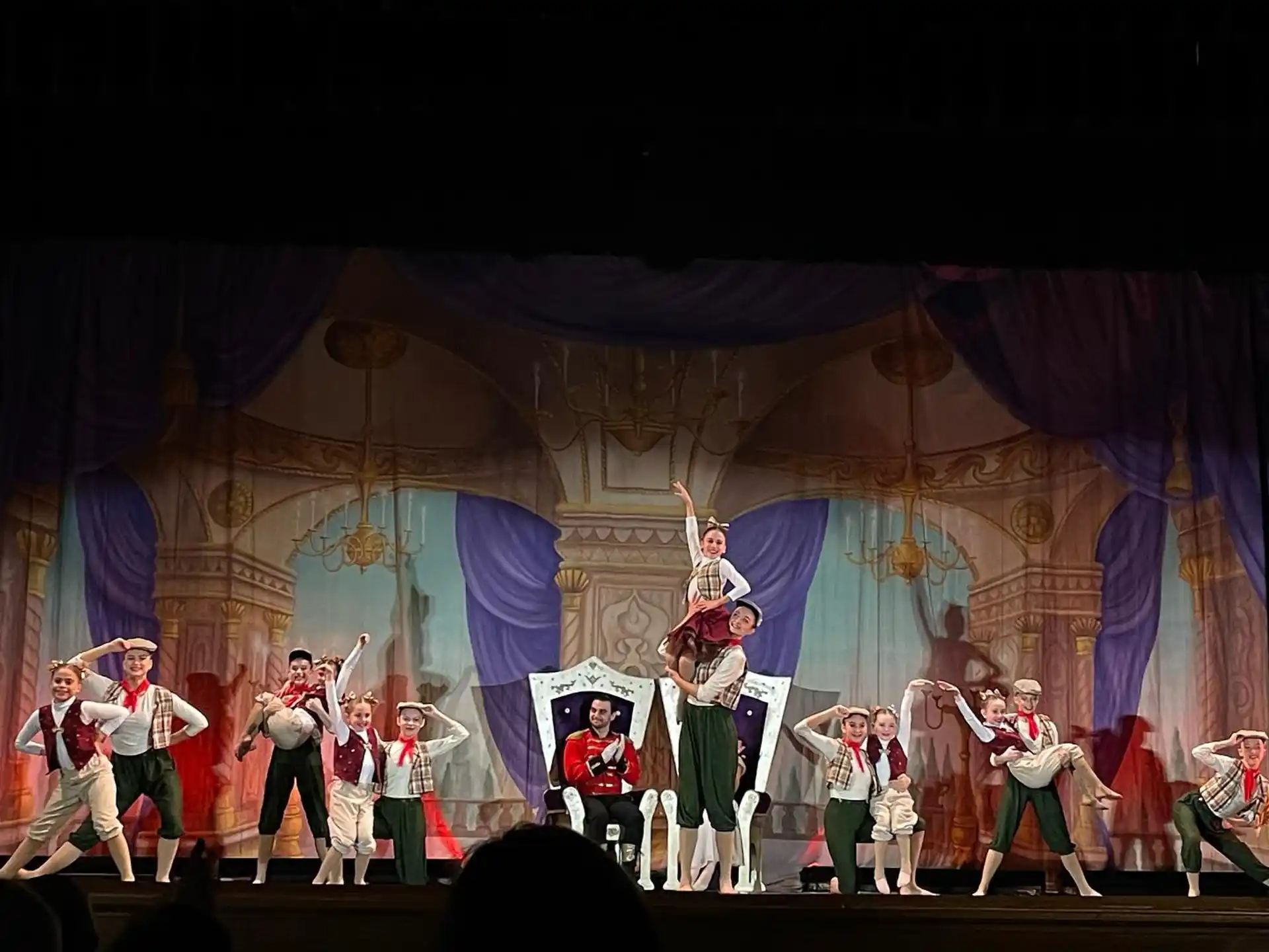 a group of people performing on a stage