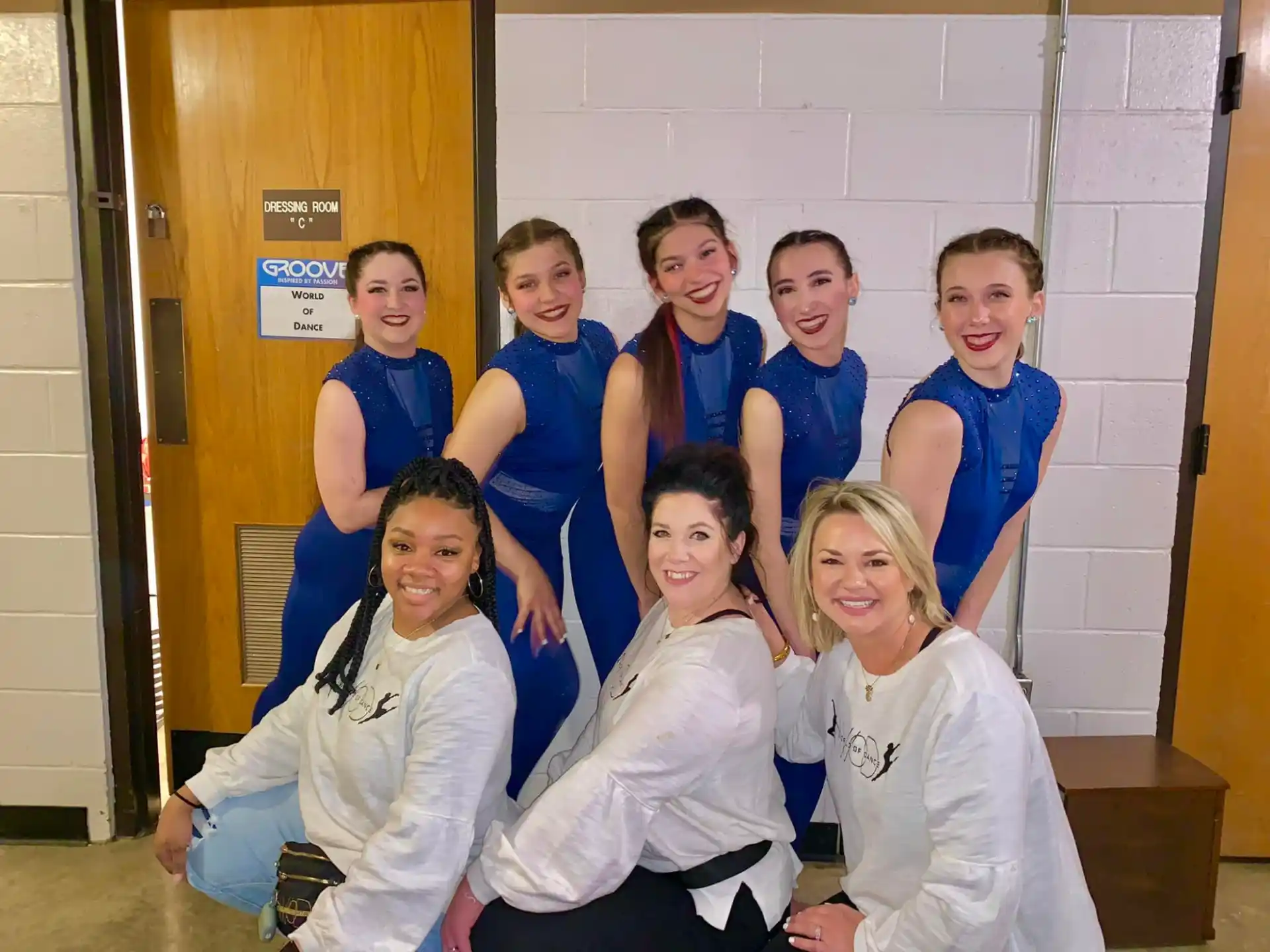a group of people posing for a photo