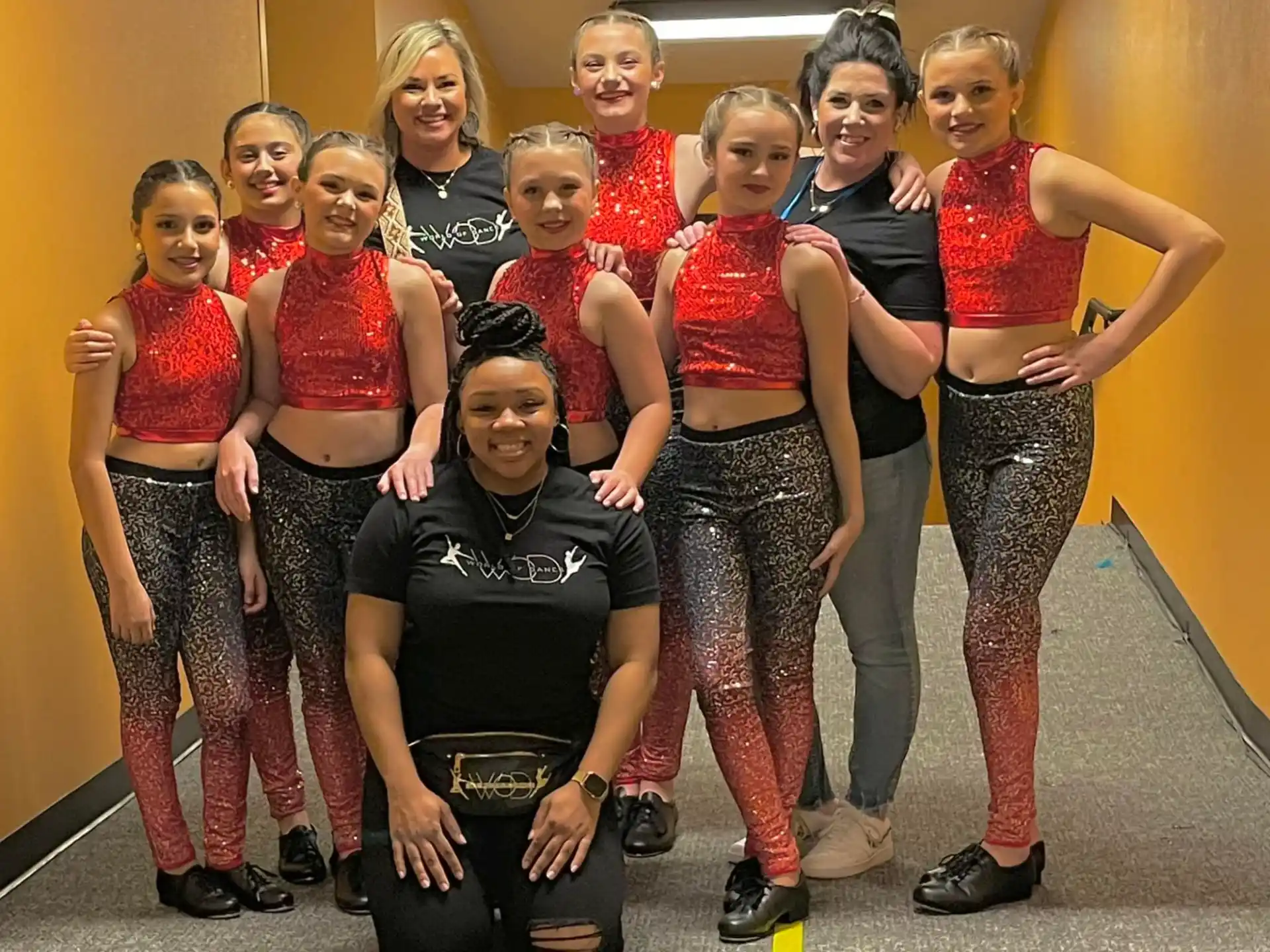 a group of women posing for a photo
