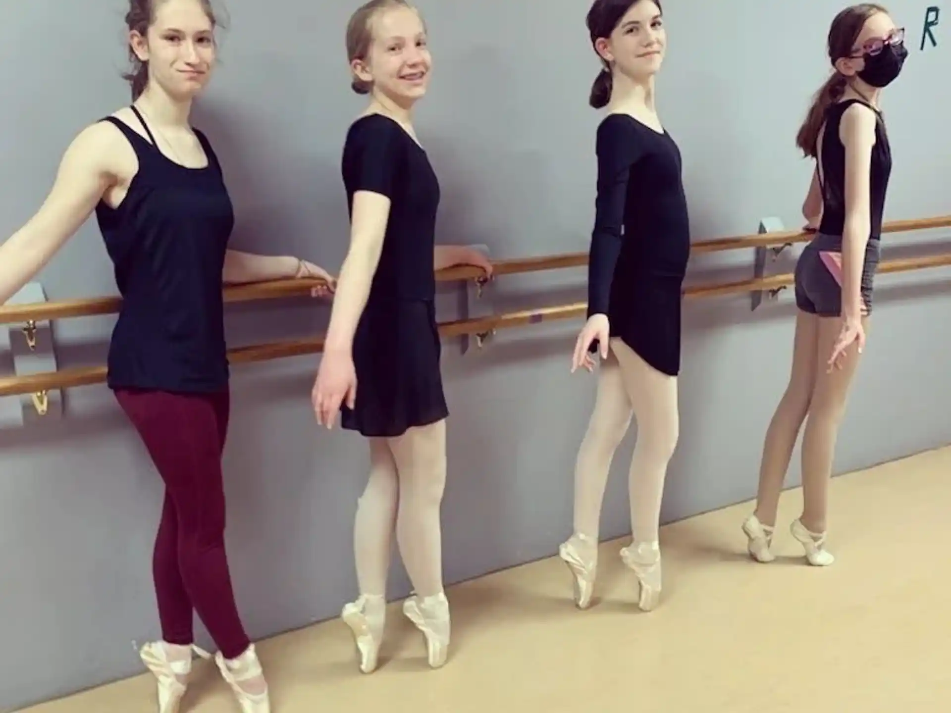 a group of women posing for a picture