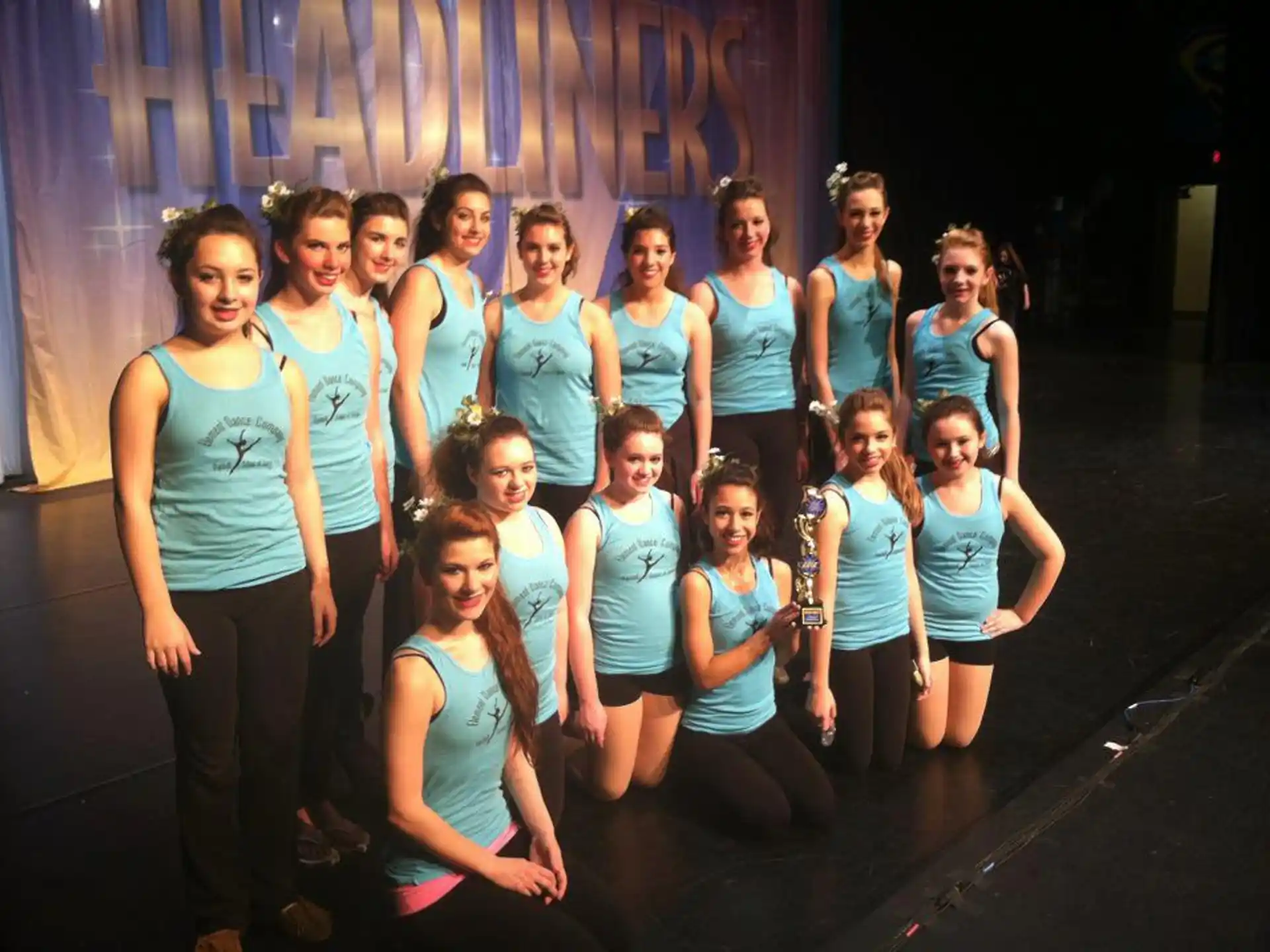 a group of girls posing for a photo