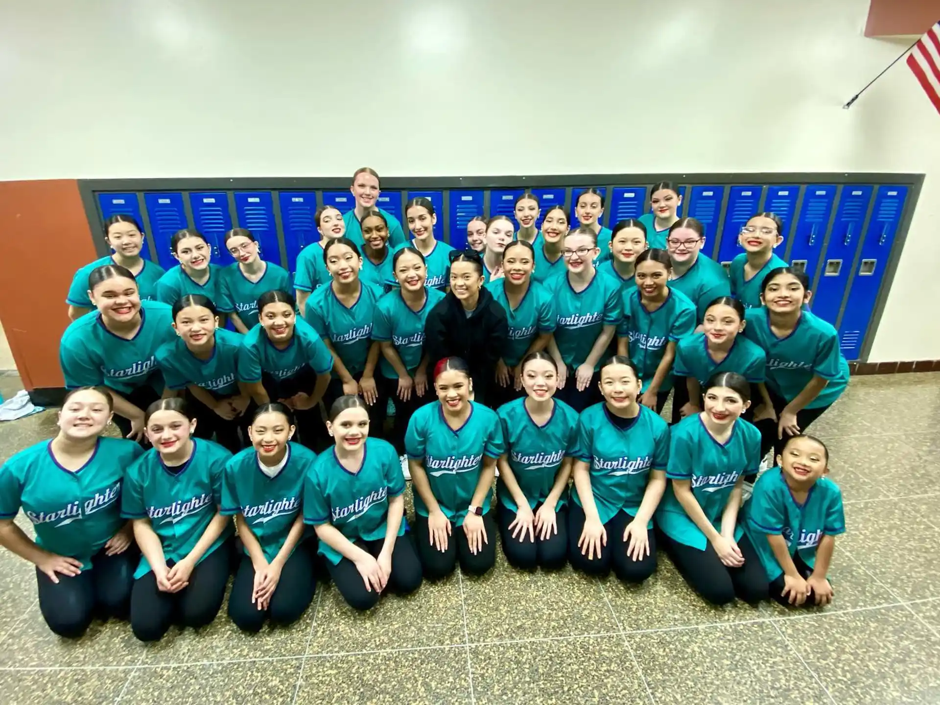 a group of people wearing matching t-shirts