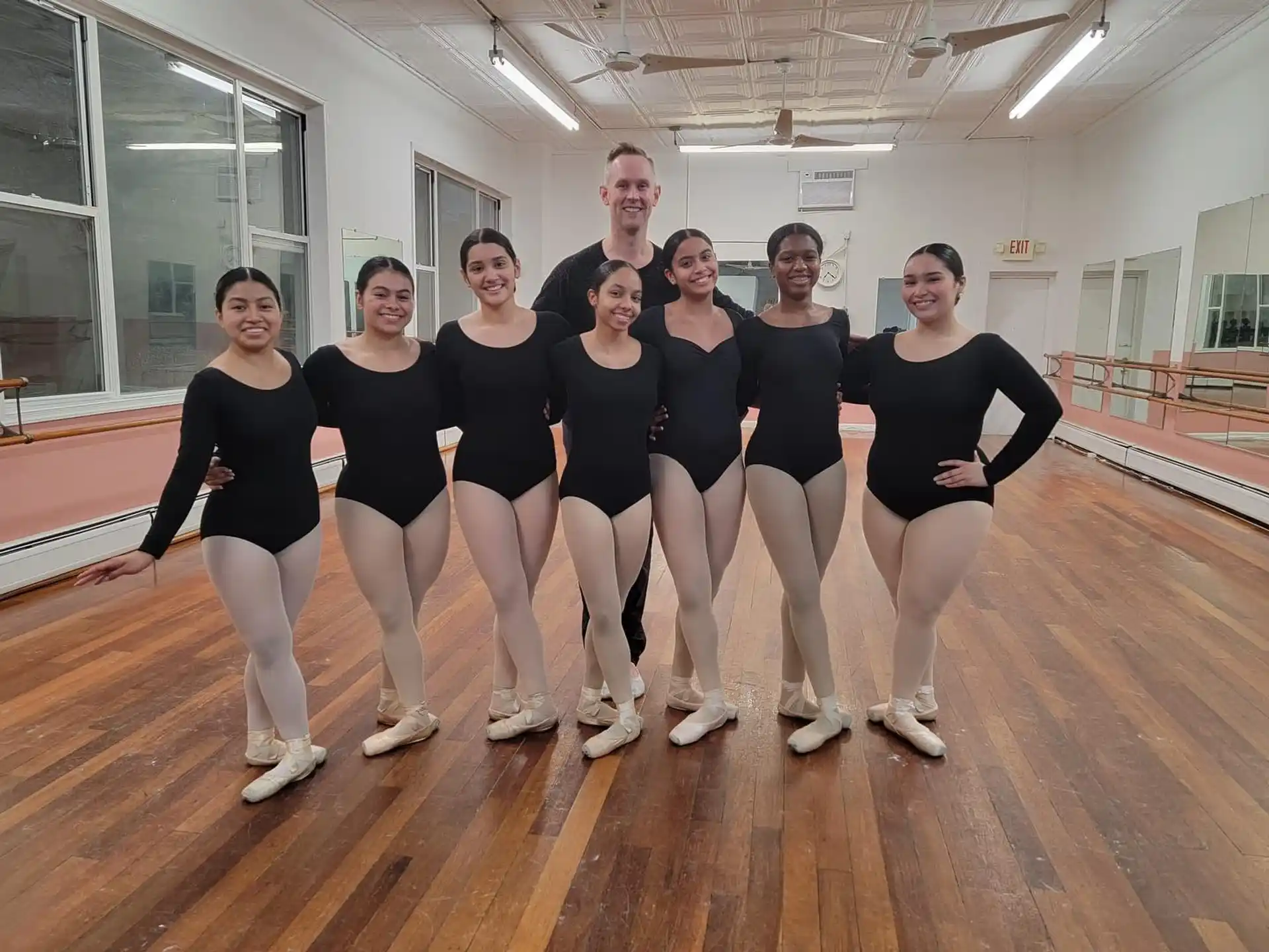 a group of people posing for a photo