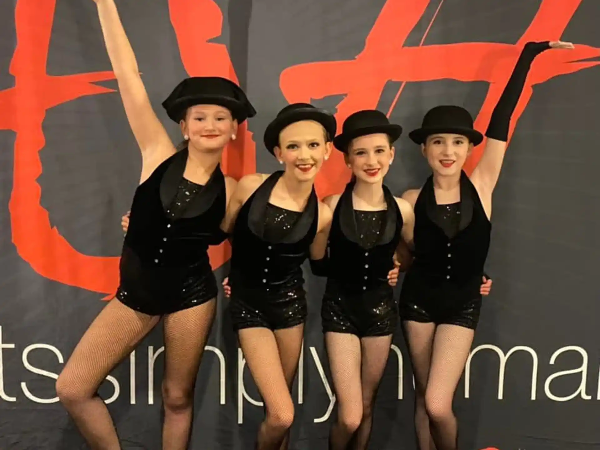 a group of women posing for a picture
