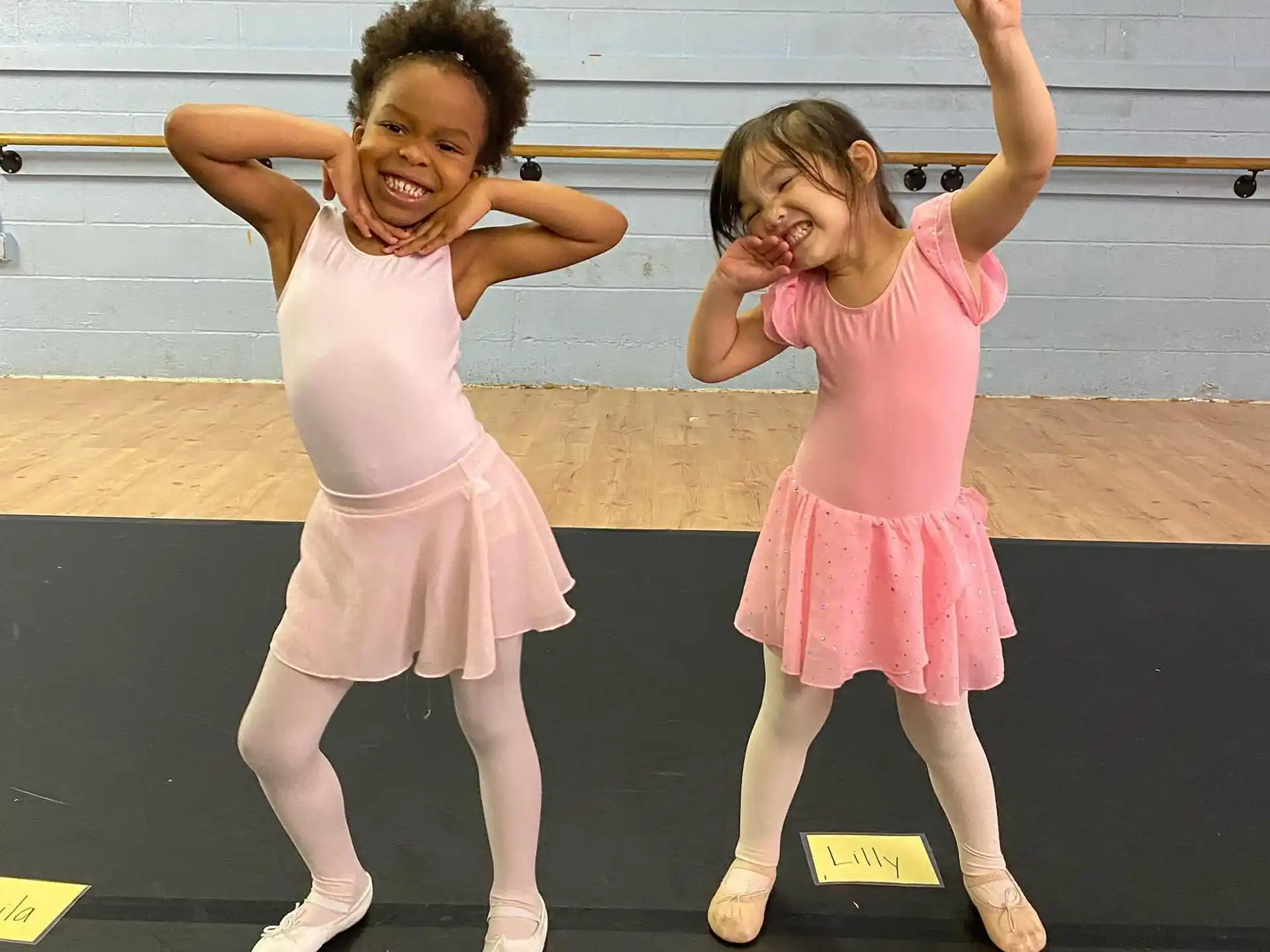 two girls in dresses