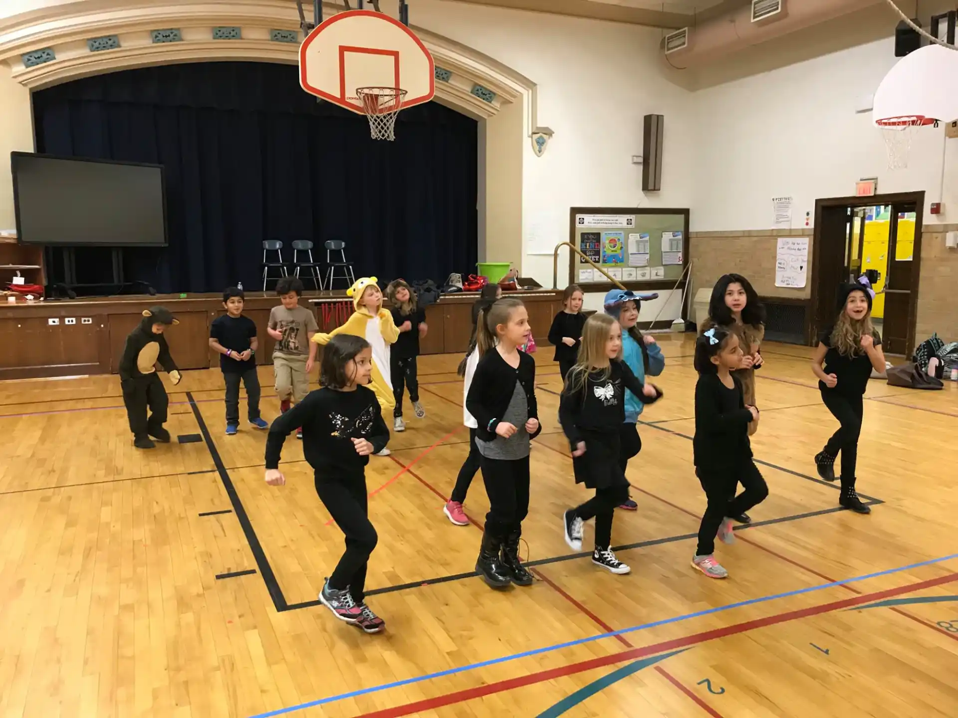 a group of people in a gym